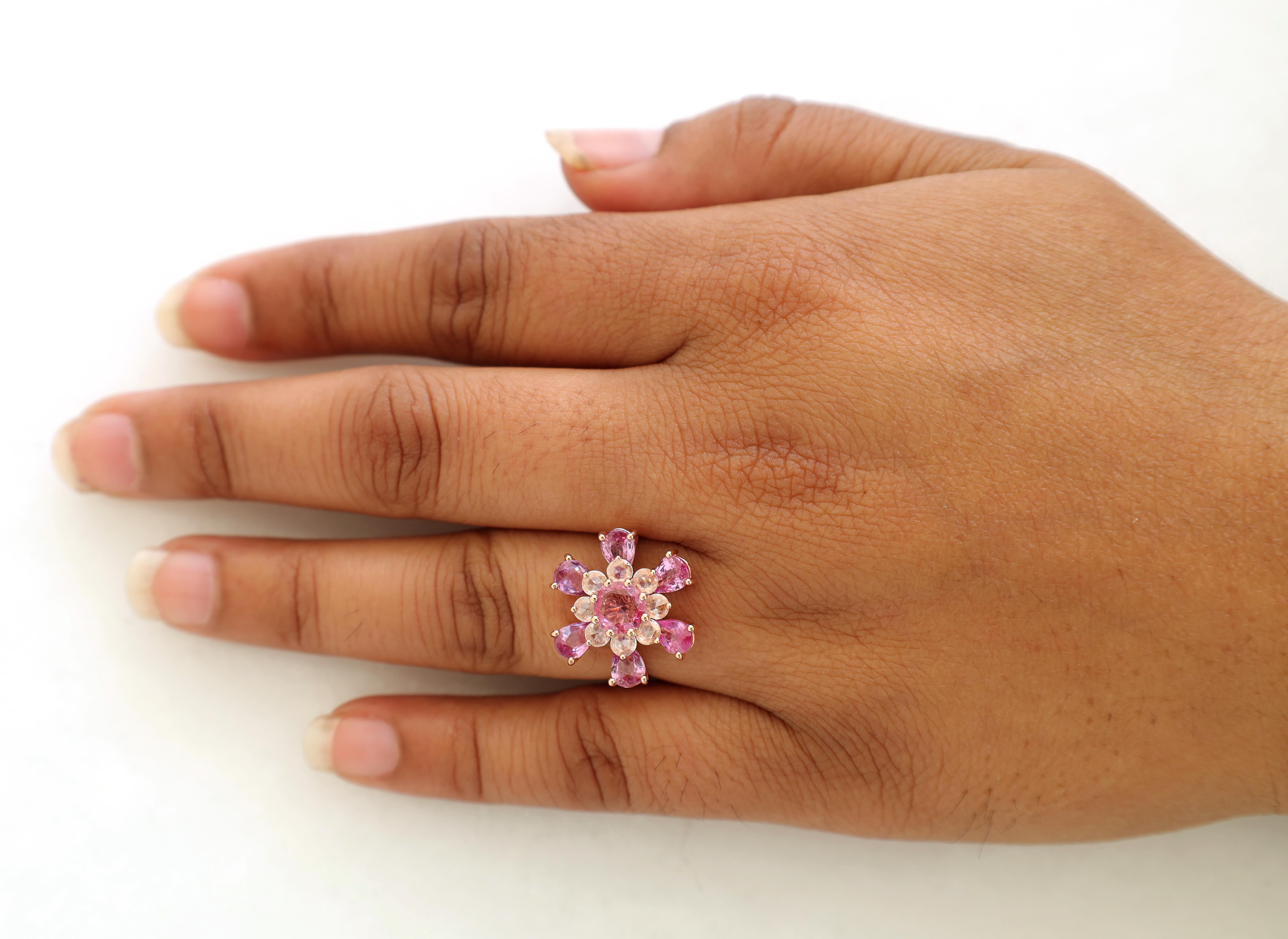 Contemporary 1 Round Pink Sapphire Surrounded by 6 Pear Shape Sapphire Ring For Sale