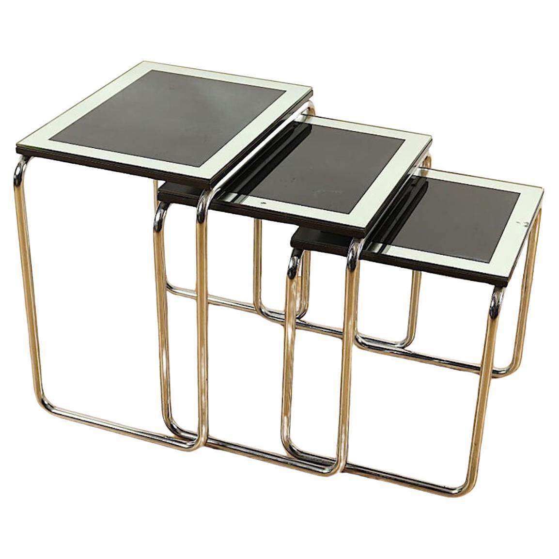 1 set of three Art Déco Nesting tables. England 1920s. Chromed with Glass.