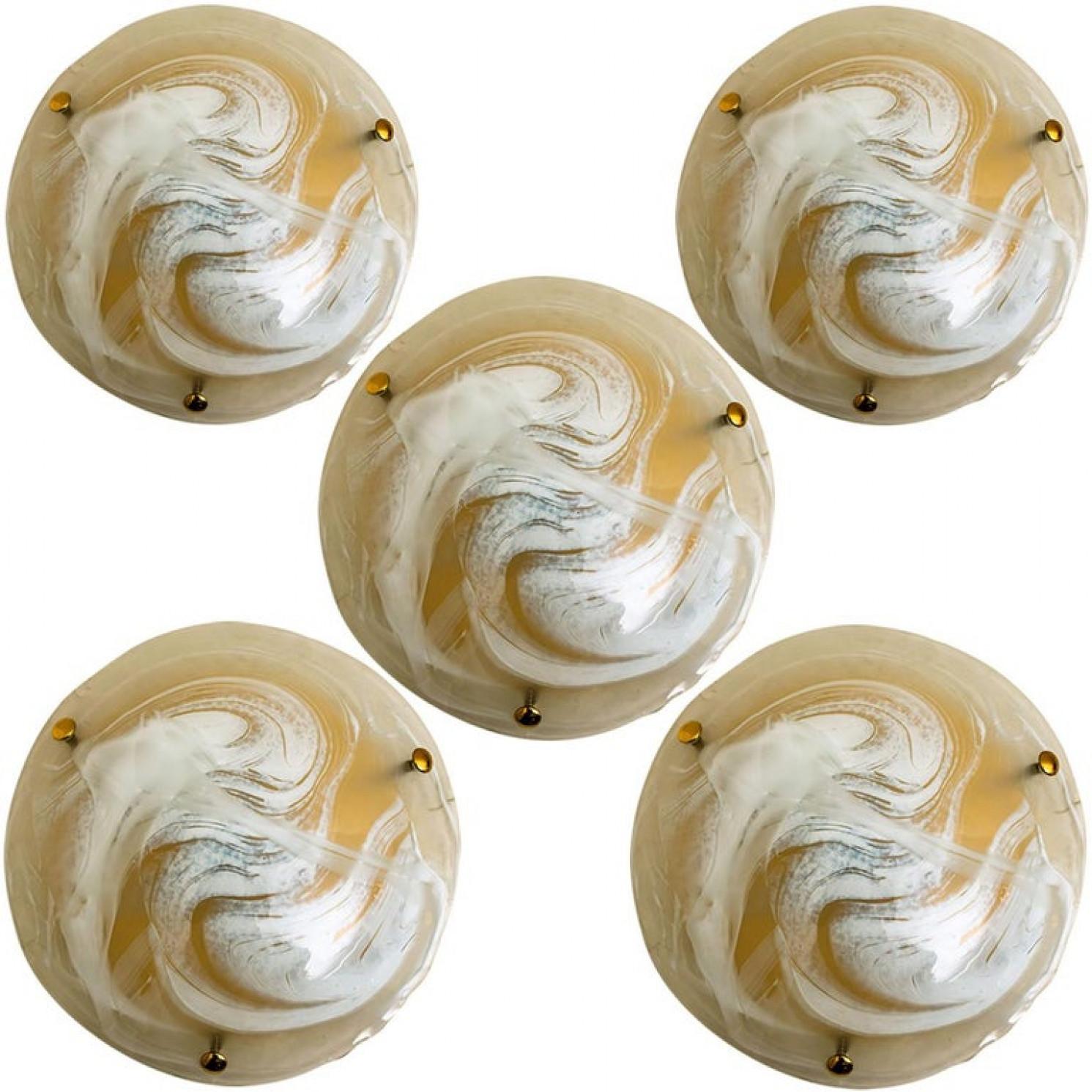 One of the ten high quality modern thick textured ice glass flush mount or wall lights by Hillebrand, circa 1965.

Each light fixture is featuring a huge round blown glass dish. Can work as impressive wall lights but also as flush mounts.
Two sizes: