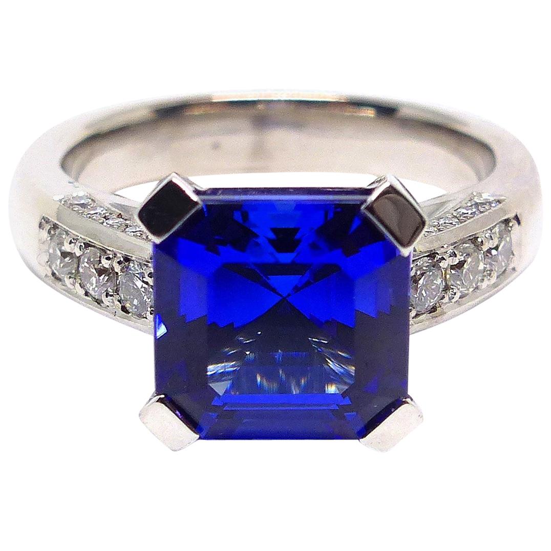Ring in White Gold with 1 Tanzanite Asscher Cut and Diamonds. For Sale