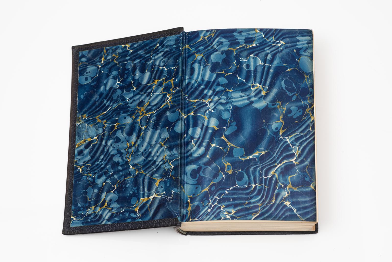 1. Vol. M. Rostovtzeff. The Social & Economic History of The Roman Empire. Bound in full blue calf, top edged gilt, raised band, marbled endpapers, illustrated. Published: Oxford, Claredon Press 1926.
H: 9 3/4