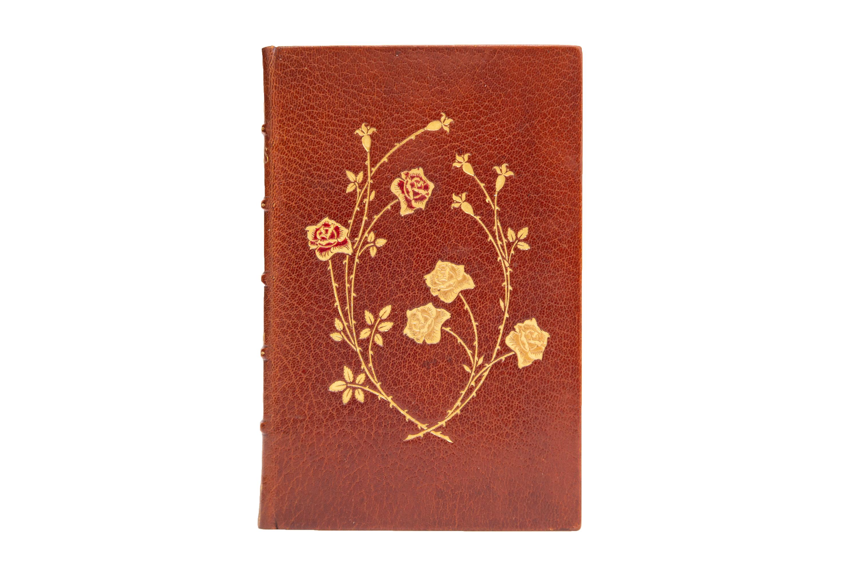 1 Volume. Alfred Lord Tennyson, The Works. Bound in full brown morocco with the front cover displaying beautiful flowers in gilt tooling, red, and white inlay. Raised bands gilt with panels displaying gilt, red, and white inlay flowers as well as