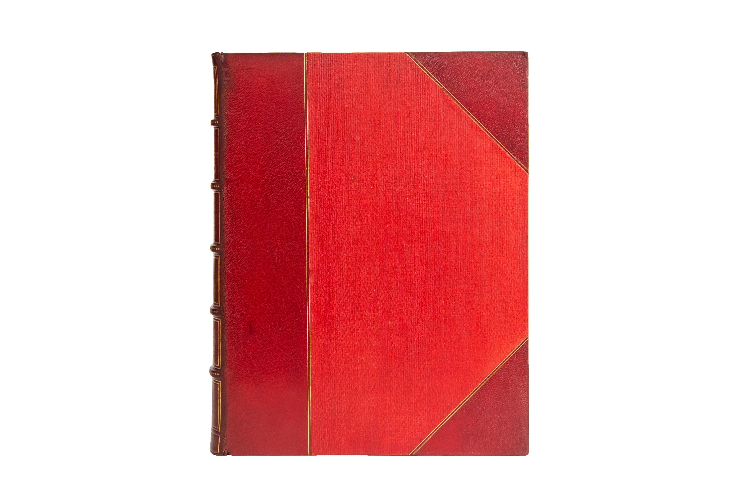 1 Volume. Andrew Lang, Prince Charles Edward. Limited Edition. Bound by Riviere & Son in 3/4 red morocco and linen boards, bordered in gilt tooling. Raised bands, dotted in gilt tooling with panels displaying borders, royal detailing, and label