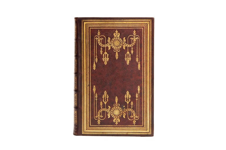 1 Volume. (Anon) The Holy Bible. Stereotype edition. Bound in full brown morocco with covers displaying beautifully ornate gilt-tooled detailing and borders. Raised bands with panels displaying ornate floral detailing and label lettering, both