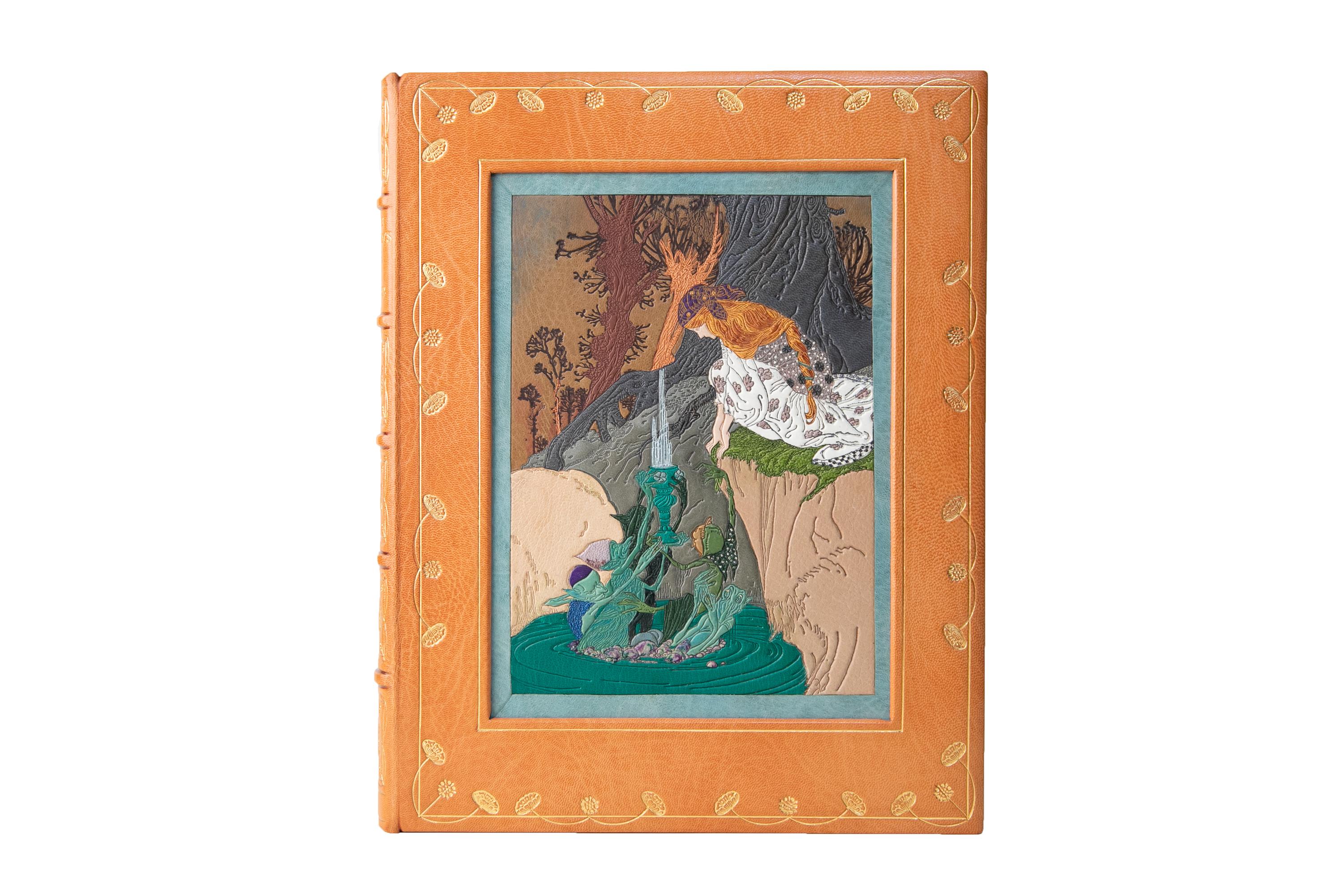 1 Volume. Arthur Rackham, Book of Pictures. Signed Limited Edition. Bound by Sangorski & Sutcliffe in full orange morocco. The cover displays a scene depicting a woman by the riverside being handed a challis by trolls in multi-colored inlay with a