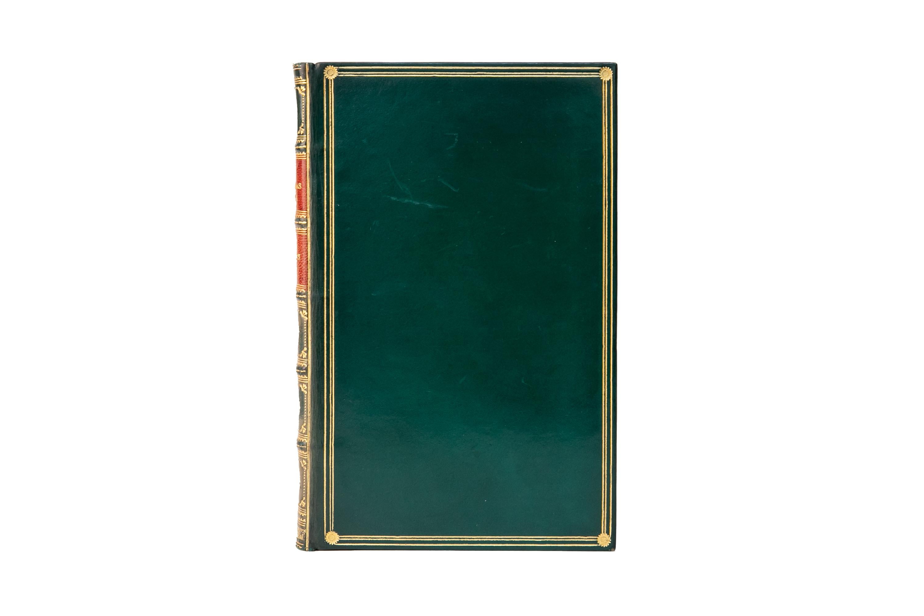 1 Volume. Charles Dickens, A Christmas Carol. Bound by Zaehnsdorf in full green calf with gilt-bordered covers. The raised band spine displays gilt-tooled detailing and red morocco labels. All edges are gilt with gilt-tooled dentelles and marbled
