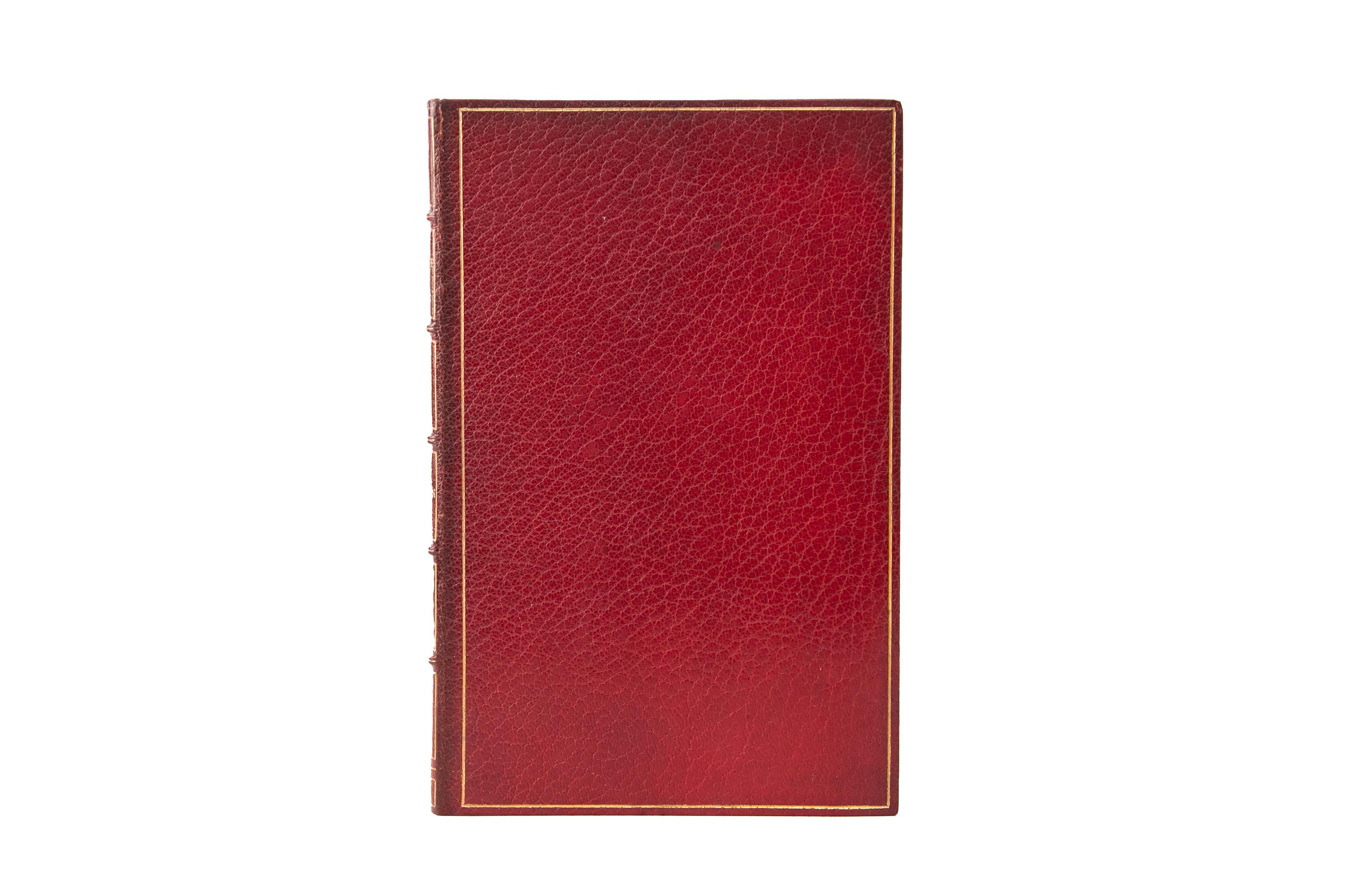 1 Volume. Charles Eliot Norton, The New Life of Dante Alighieri. Reliure en plein maroquin rouge, avec une bordure dorée sur la couverture. Le dos présente des bandes en relief et des détails dorés. Le bord supérieur est doré avec des dentelles