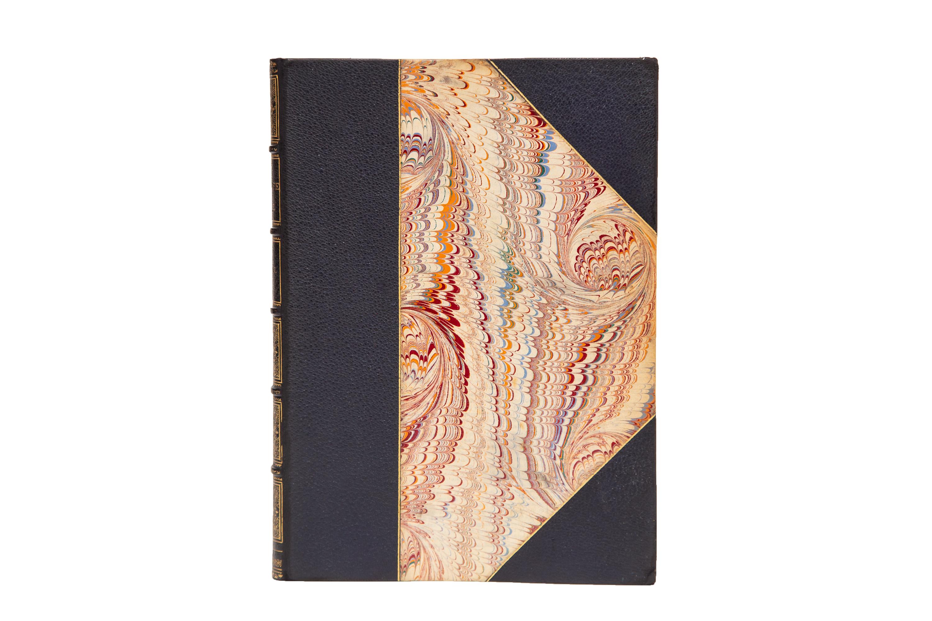1 Volume. Dante Alighieri, The New Life. Bound in 3/4 navy morocco and marbled boards, bordered in gilt. Raised bands gilt with panels displaying beautiful Egyptian floral gilt tooling and label lettering in gilt. The top edge is gilt with marbled