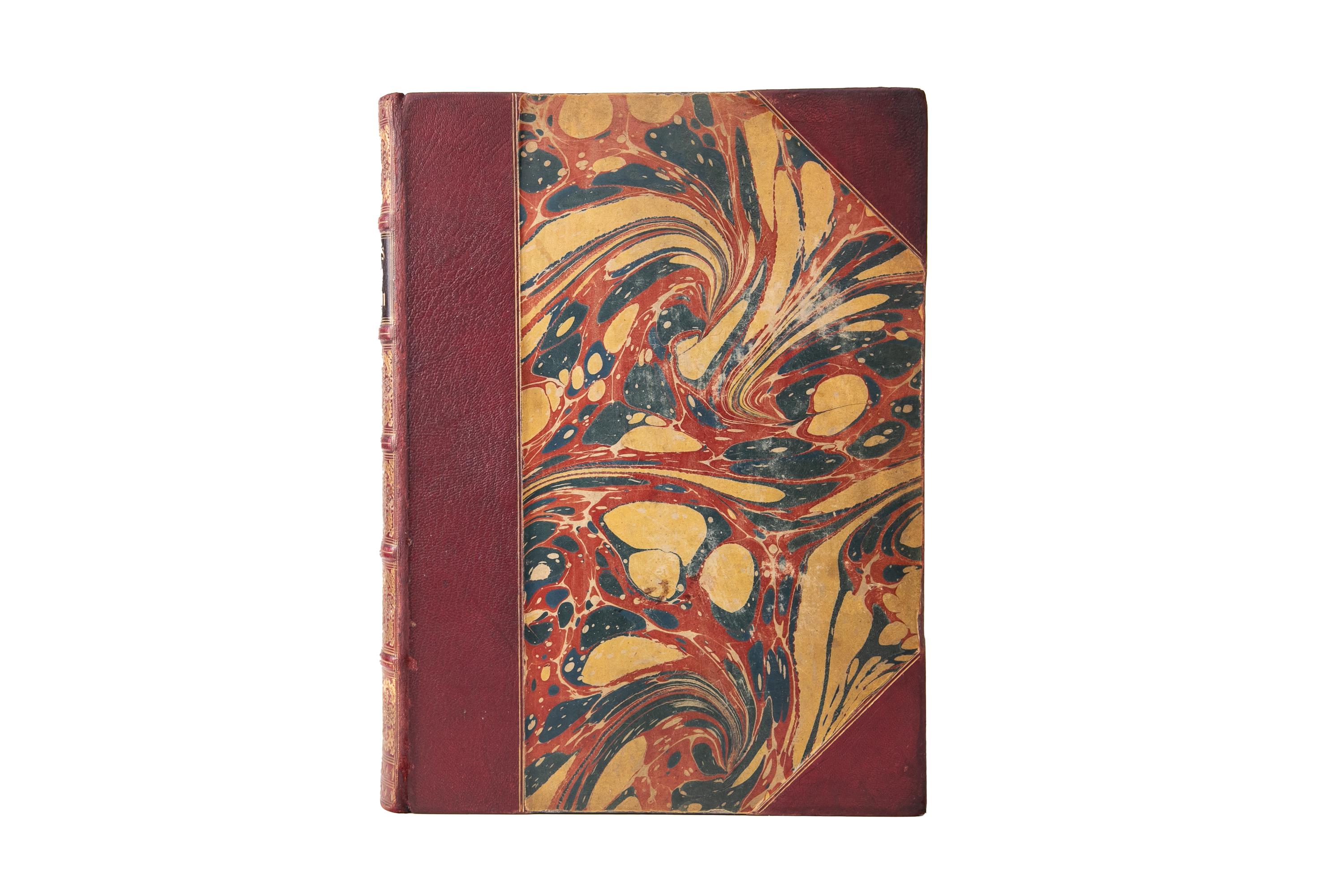 1 Volume. Edmund Lodge, Portraits of Illustrious Personages. Bound in 3/4 wine morocco and marbled boards, bordered in gilt-tooling. Raised band spine with gilt-tooled details and a black morocco label. All of the edges are gilded with marbled