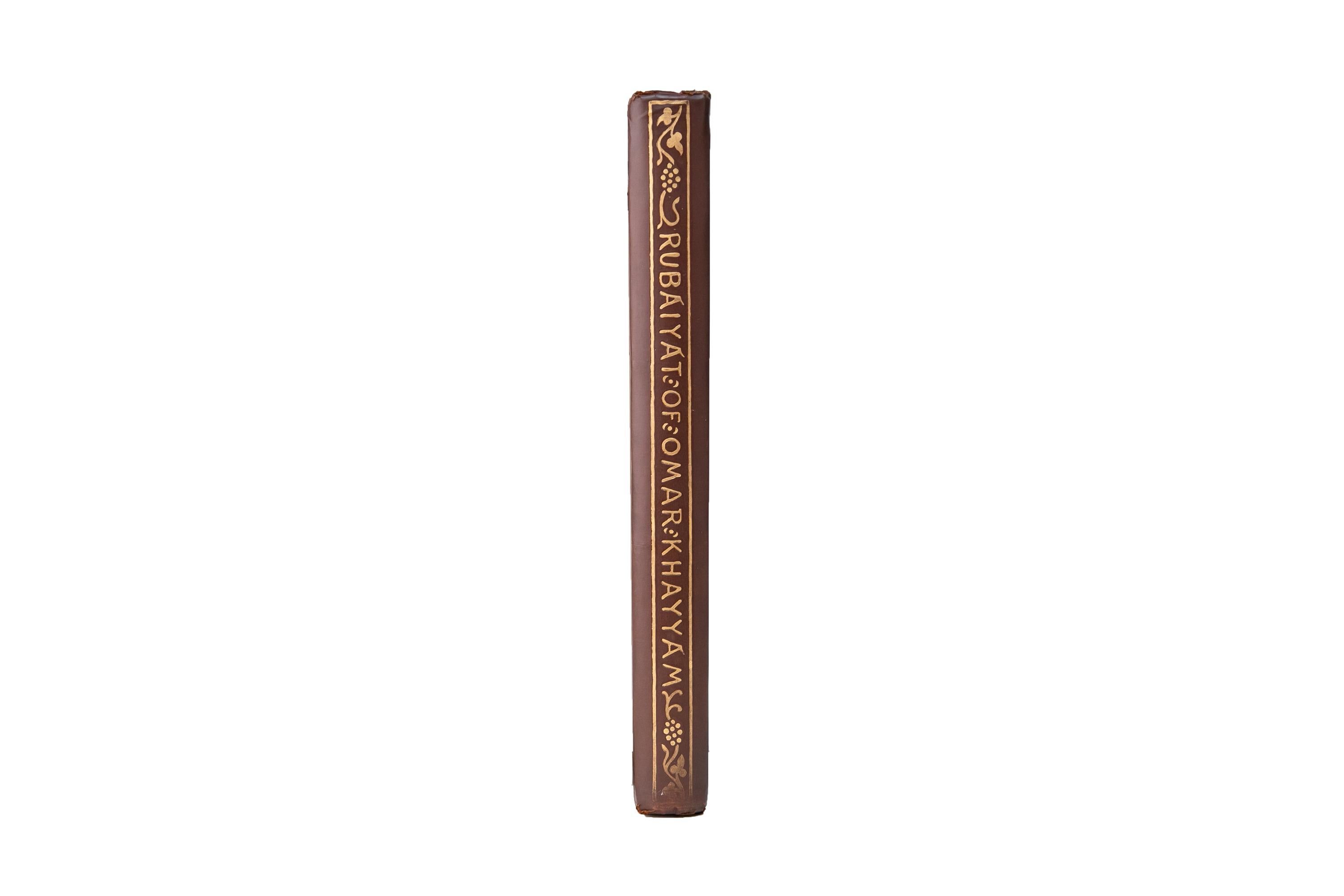 1 Volume. Edward Fitzgerald, Rubáiyát of Omar Khayyám First Edition. Bound in full brown cloth with the covers displaying decorative title lettering, floral detailing, and other decorations, all gilt-tooled. The spine displays gilt-tooled label
