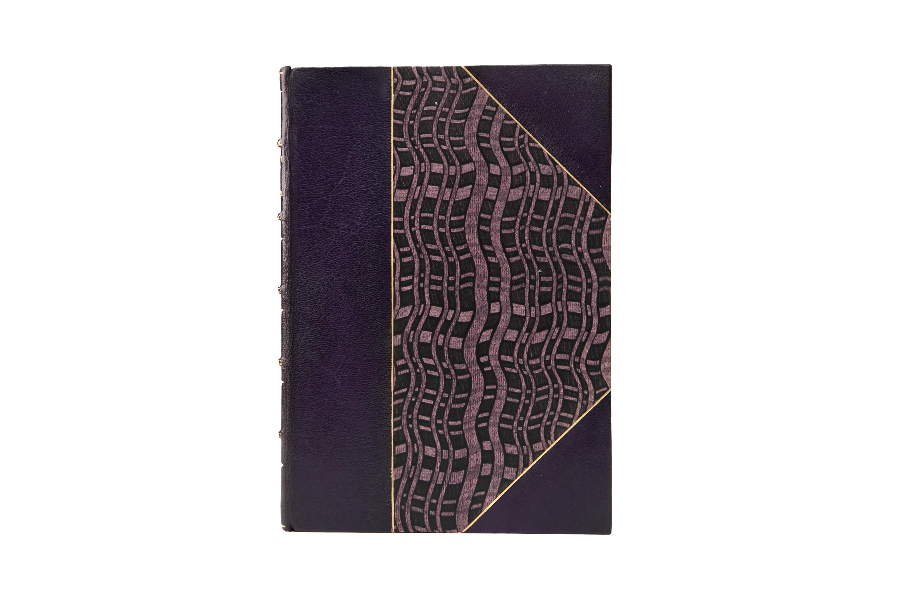 1 Volume. Edward Fitzgerald, Rubáiyát of Omar Khayyám. Bound by Whitman Bennet Binderies in 3/4 purple morocco and decorative boards, bordered in gilt-tooling. The spines display raised bands and ornate gilt-tooled detailing. The top edge is gilded