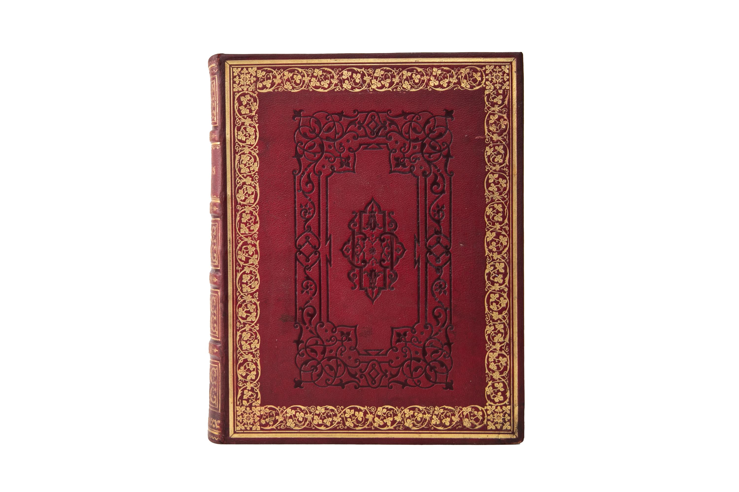 1 Volume. Emma Roberts, Hindostan. Bound in full red morocco with the covers displaying open-tooled central details, and gilt-tooled floral bordering details. The spines display raised bands, label lettering, bordering, and panel details, all