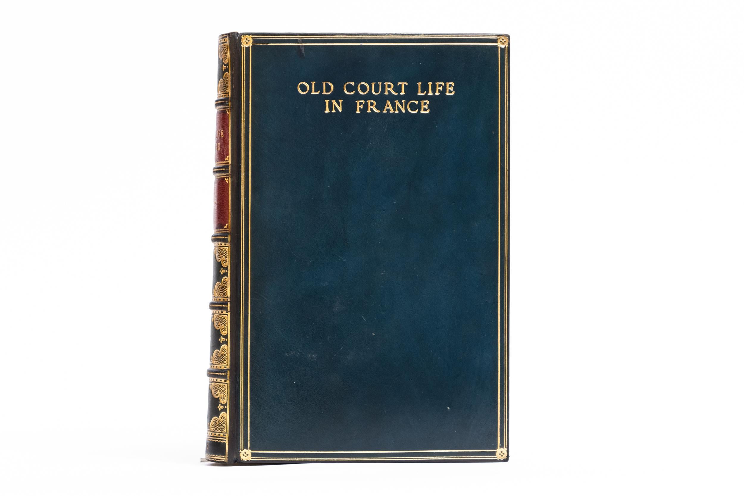 1 Volume. Frances Elliot, Old Court Life in France. Bound in full blue calf. Gilt-tooled title on front cover. Raised bands. All edges gilt. Marbled endpapers. Decorative gilt on spines. Binding by Sangorski & Sutcliffe. Includes 58 illustrations.