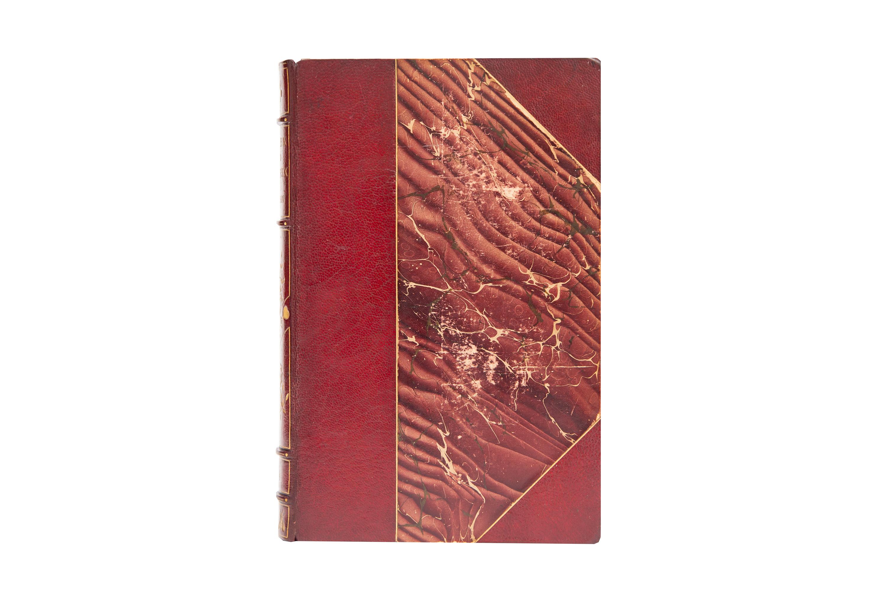 1 Volume. Frederic Masson, Napoleon and the Fair Sex. Bound in 3/4 red morocco and marbled boards by Hatchards. Raised bands gilt with panels displaying hearts and arrows, Napoleonic wreaths, and bee emblems as well as label lettering in gilt. The