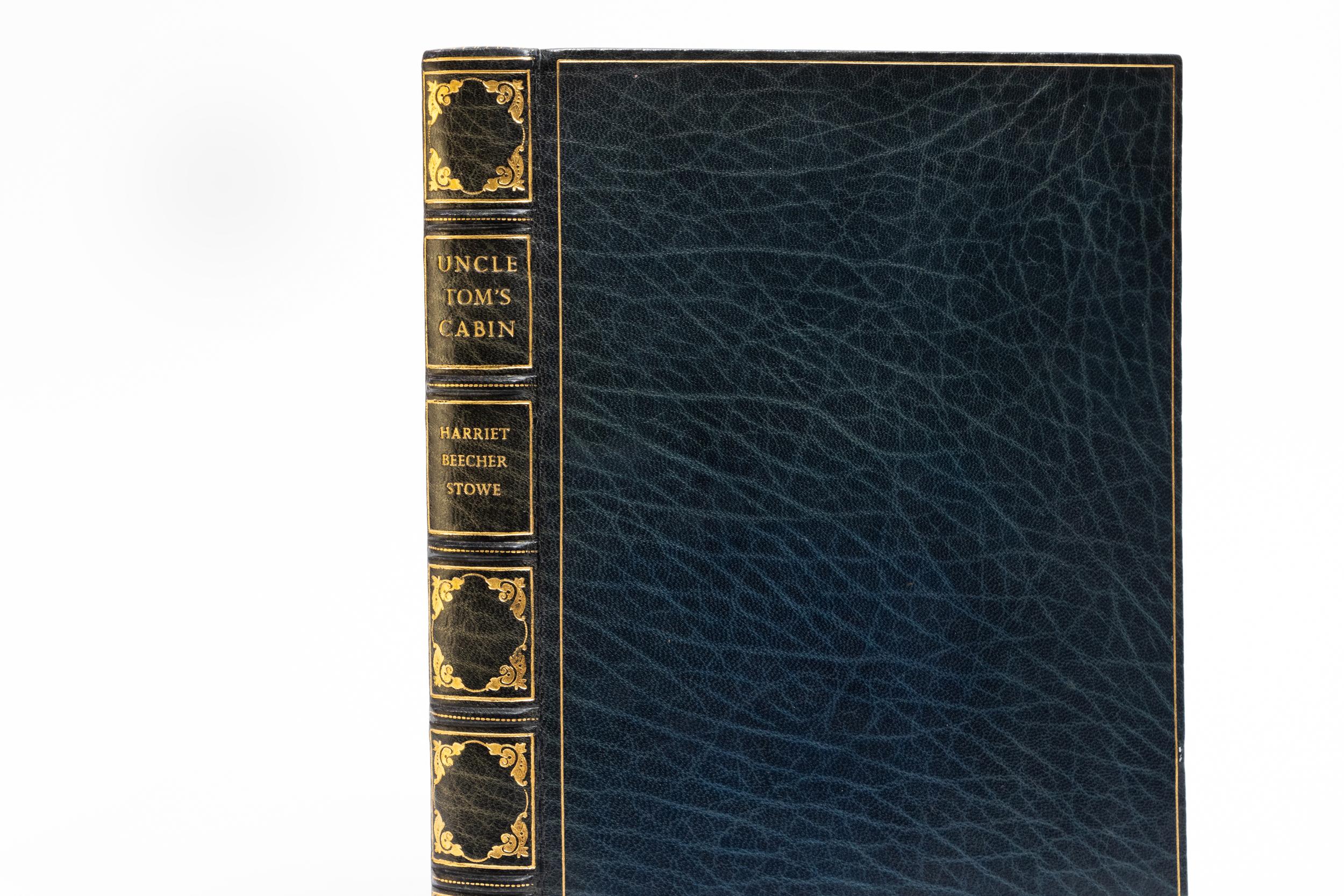 1 Volume. Harriet Beecher Stowe, Uncle Tom's Cabin. Bound in full blue morocco. Raised bands. All edges gilt. Decorative gilt tooling on spines. Marbled endpapers. Bound by Bayntun. Illustrated with 16 lithographs by Miguel Covarrubias. Published: