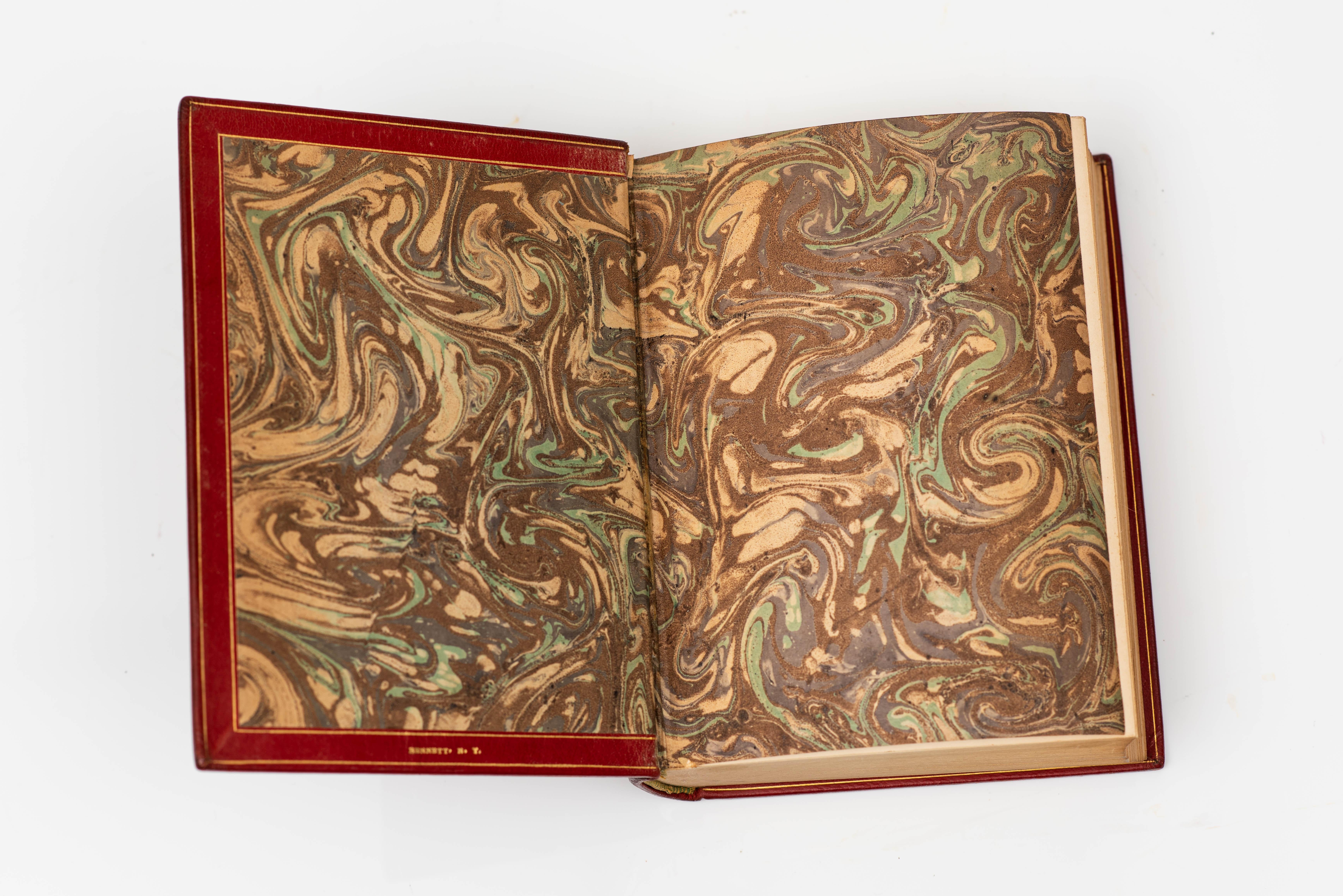 1 Volume. Herman Melville, Moby Dick. Bound in full red calf with a gilt-tooled ship on the front cover with gilt-tooling on the raised band spine. Top edges gilt. Marbled endpapers. Illustrated by Rockwell Kent. New York: Random House, 1930.