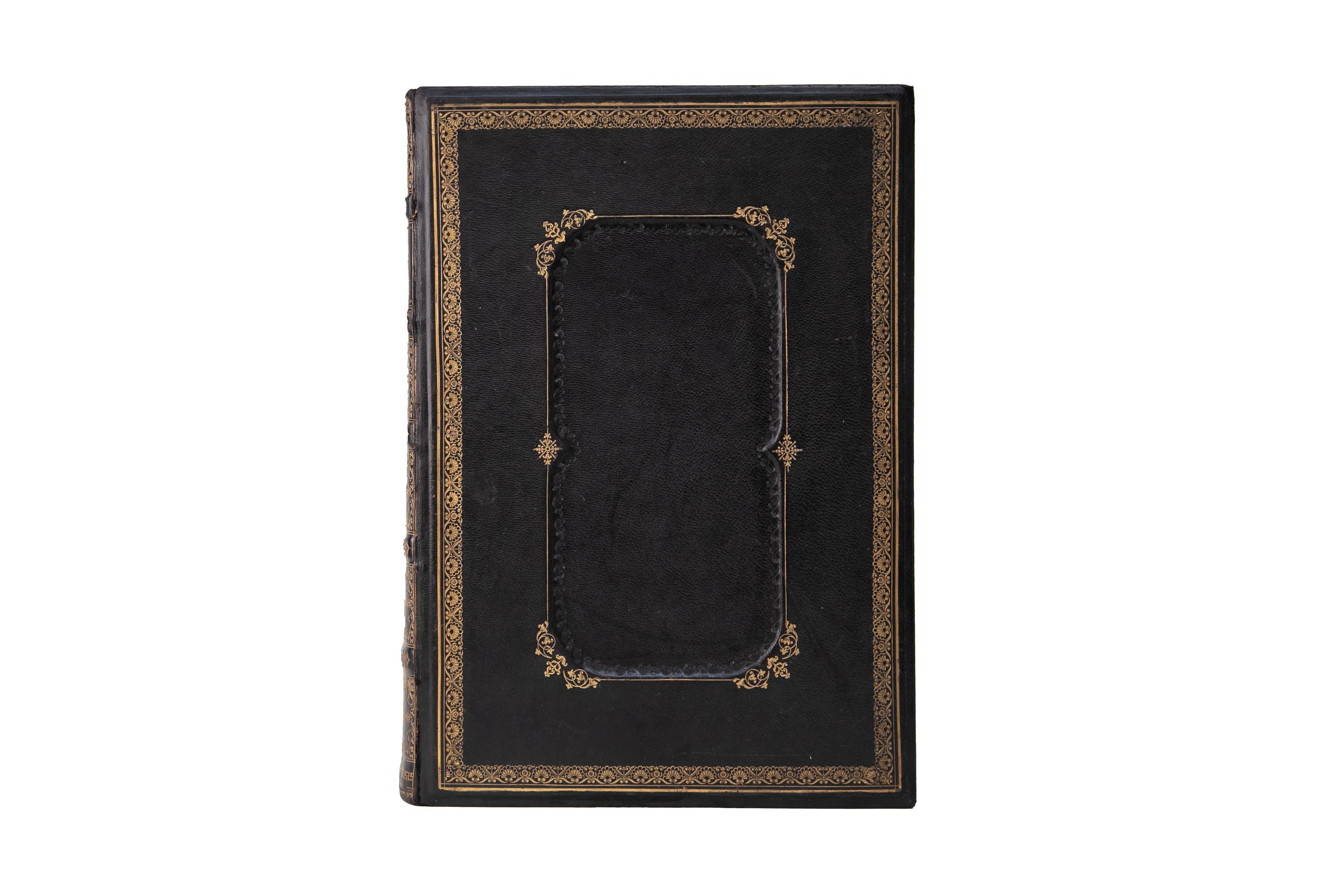 1 Volume. John Brown, The Self-Interpreting Holy Bible. Bound in full black morocco with the covers and raised bands displaying gilt-tooled detailing. All edges gilt, gilt-tooled dentelles, and marbled endpapers. Contains the Old and New Testaments