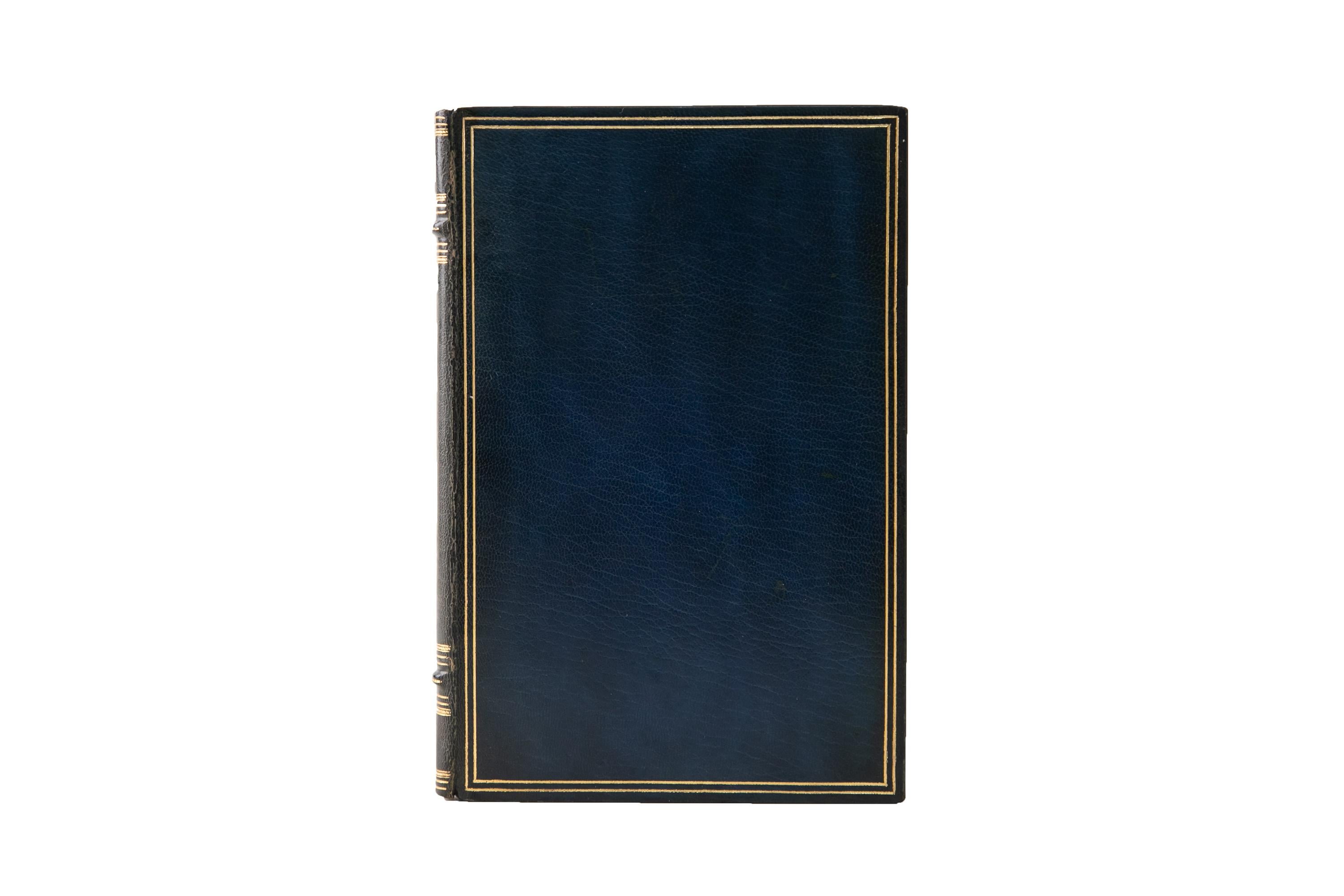 1 Volume. Kahlil Gibran, The Prophet. Bound in full blue morocco with the covers displaying a double-ruled gilt-tooled border. The spines display raised bands, bordering, floral panel detailing, and label lettering, all gilt-tooled. The top edge is