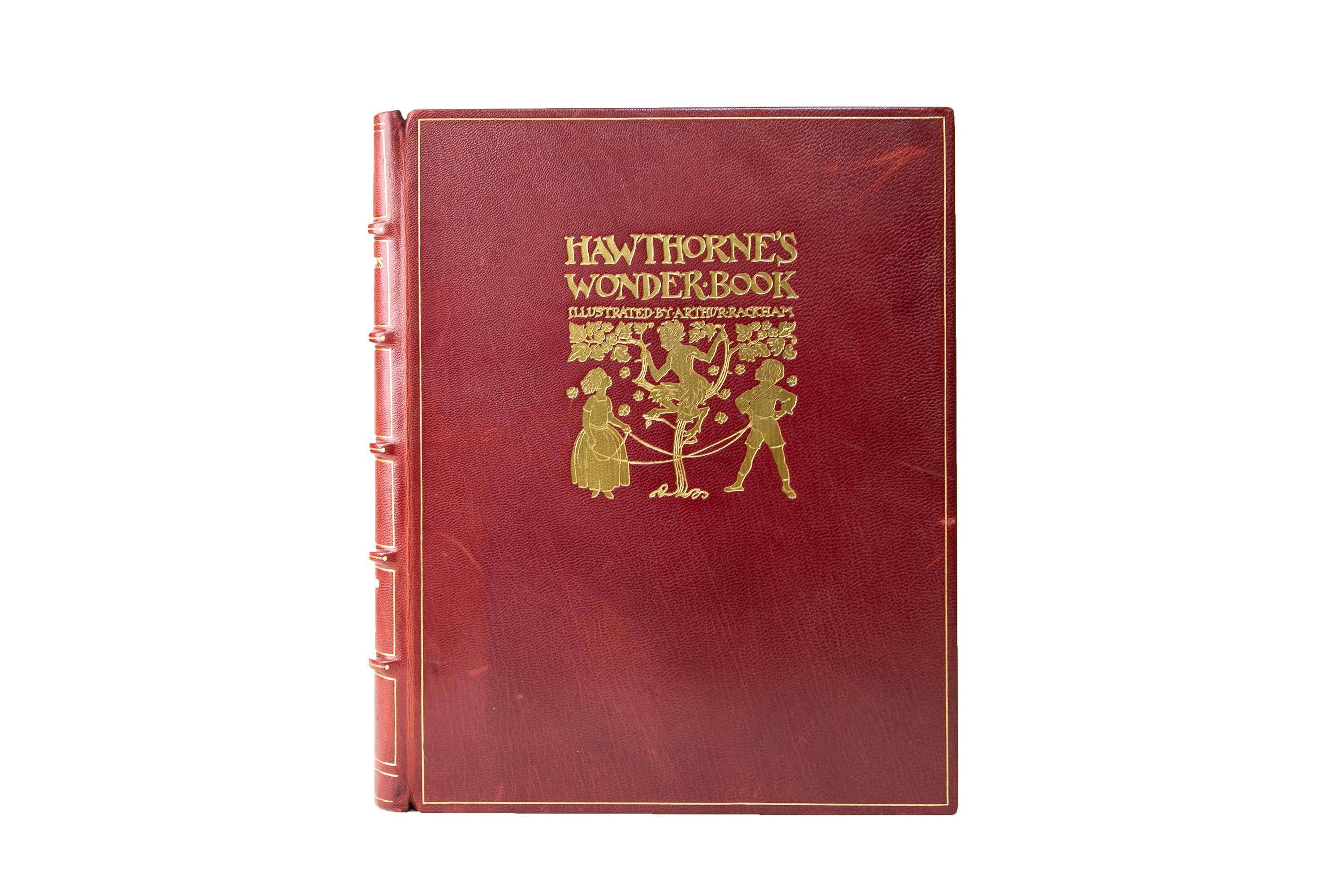 1 Volume. Nathaniel Hawthorne, Wonder Book. Limited Edition. Bound by the Chelsea Bindery in full red morocco with the cover displaying a gilt-tooled border, 3 figures including one elf in a tree, and title lettering, all gilt-tooled. The spine