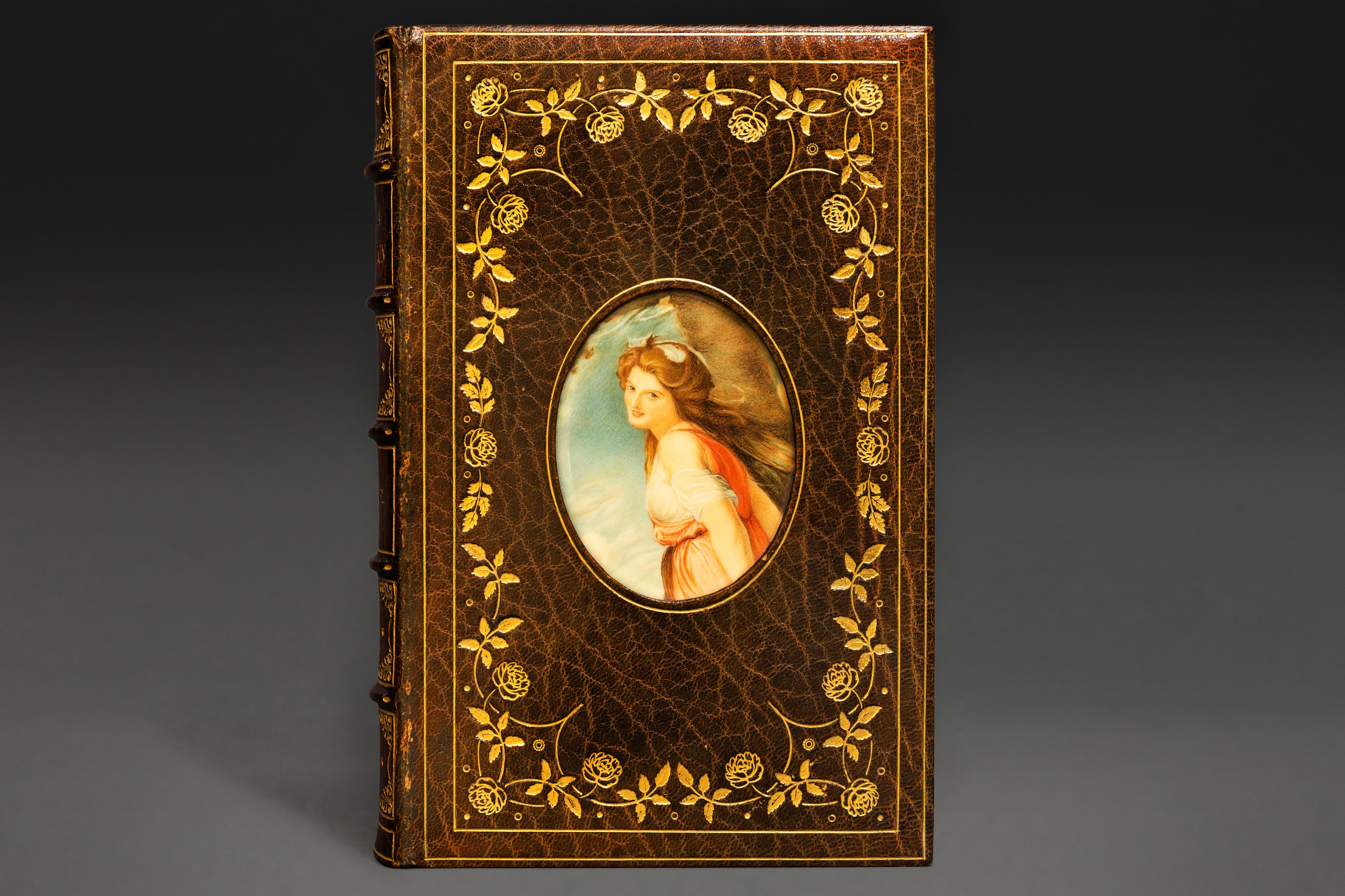 1 Volume. O.A. Sherrard, A Life of Emma Hamilton. Bound in full green morocco. Watercolor painting of Emma Hamilton under glass on front cover. All edges gilt. Raised bands. Gilt floral tooling on front cover. Linen endpapers. Bound by Bayntun and