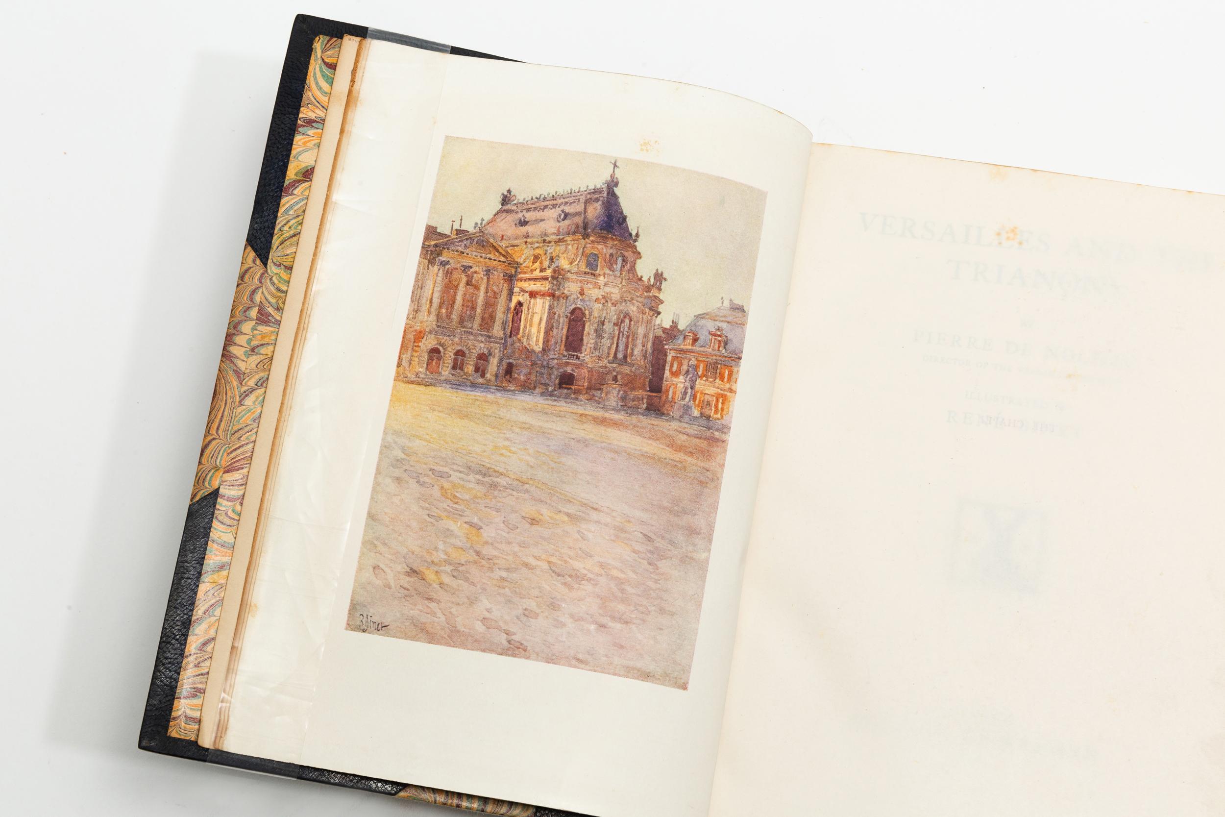 1 Volume. Pierre DeNolhac. Versailles and The Trianons. Illustrated in color by
Rene Binet. Bound in 3/4 blue morocco, marbled boards and endpapers, top edges gilt, raised bands, ornate gilt on spines.(some minor foxing)
Published: London: William