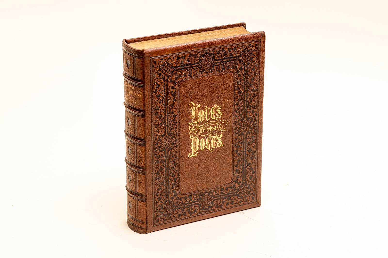 1 Volume. Richard Henry Stoddard, The Loves and Heroines of the Poets. Bound in full brown morocco with the covers and raised band spine displaying ornate gilt and open-tooled detailing. All edges are gilt with decorative gilt and blue endpapers.