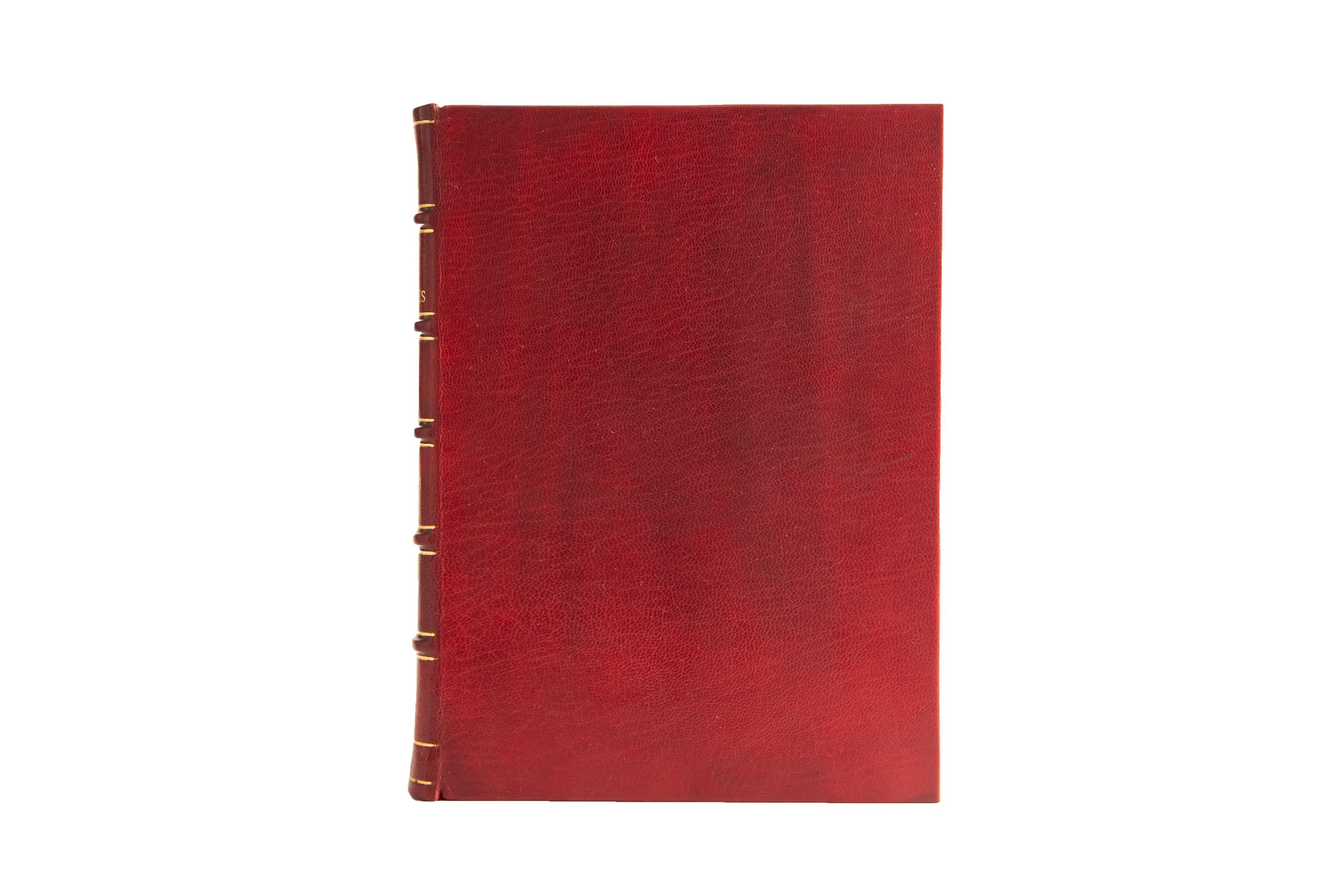 1 Volume, Rudyard Kipling, Just So Stories for Little Children. First Edition. Bound in full red morocco with raised bands and panels displaying bordering, floral detailing, and label lettering, all gilt-tooled. The top edge is gilt with marbled