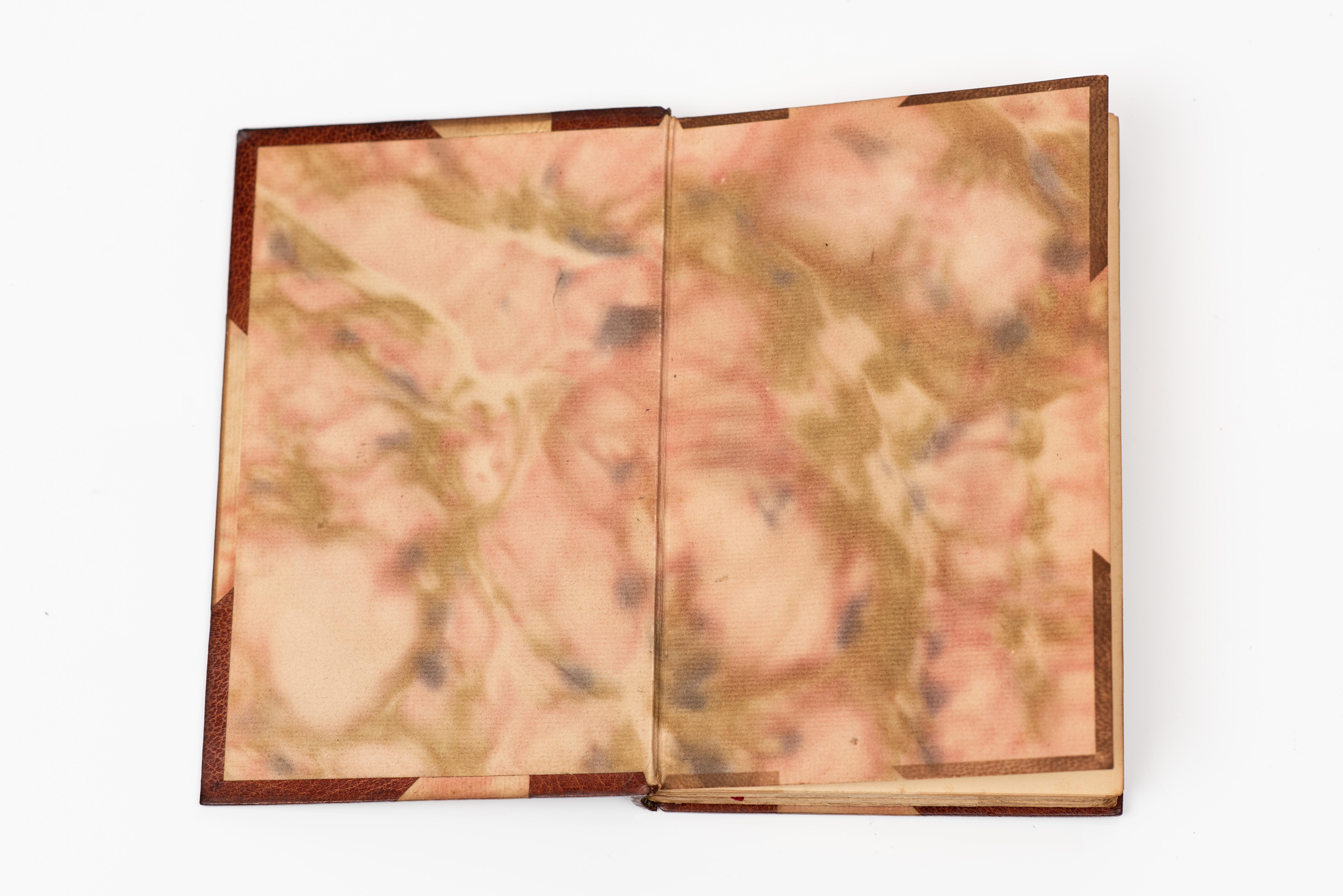 1 Volume. Stephen Phillips, Ulysses: A Drama. Bound in 3/4 tan morocco with marbled boards. Gilt-tooling on the raised band spine. Top edges gilt. Marbled endpapers. London & New York: John Lane, 1902. 