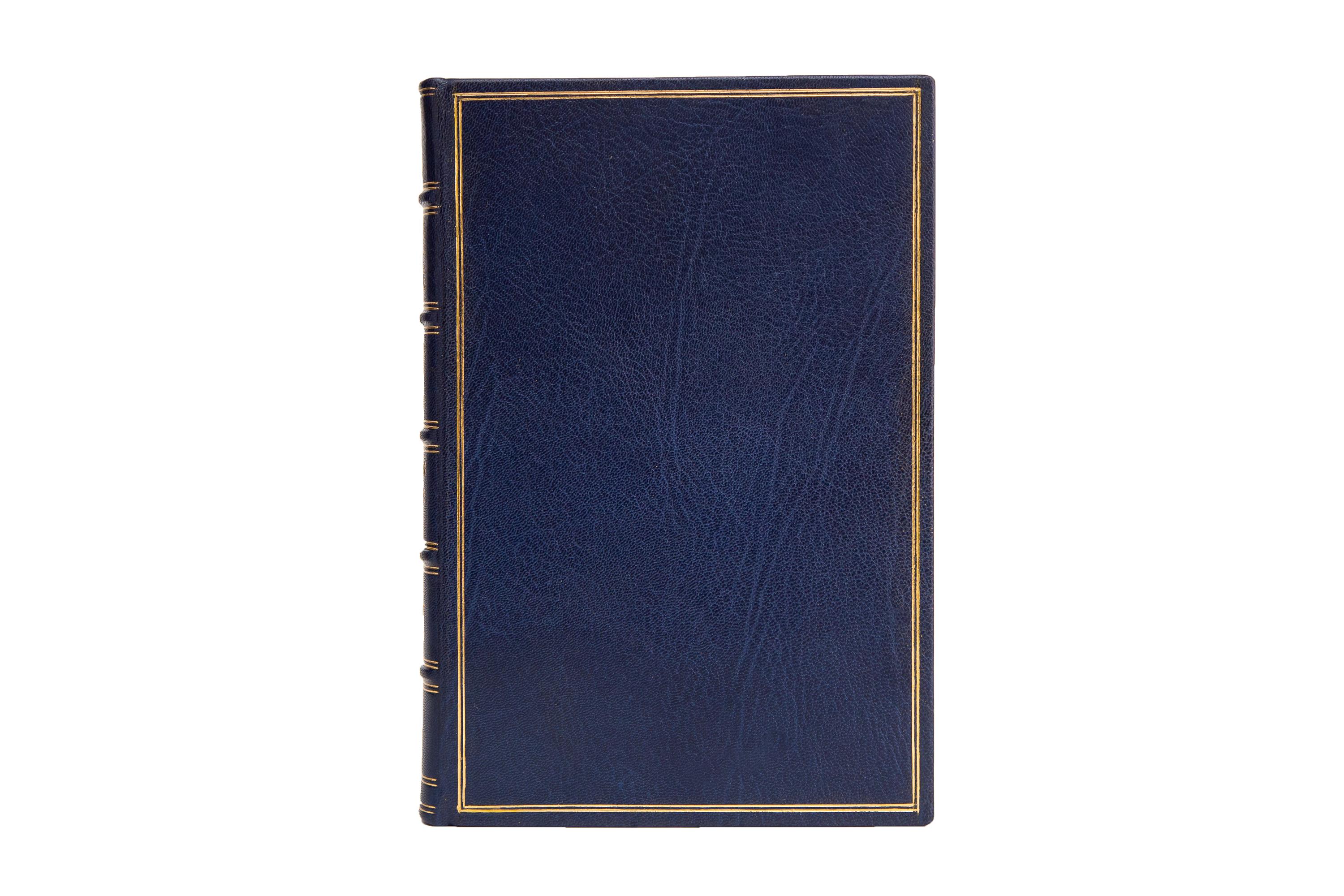 1 Volume. Thompson, Stephens & Swan, The Yacht America. Limited edition. Bound in full blue morocco with covers displaying a double-ruled gilt border. Raised bands gilt with panels displaying nautical detailing and label lettering, both gilt-tooled.