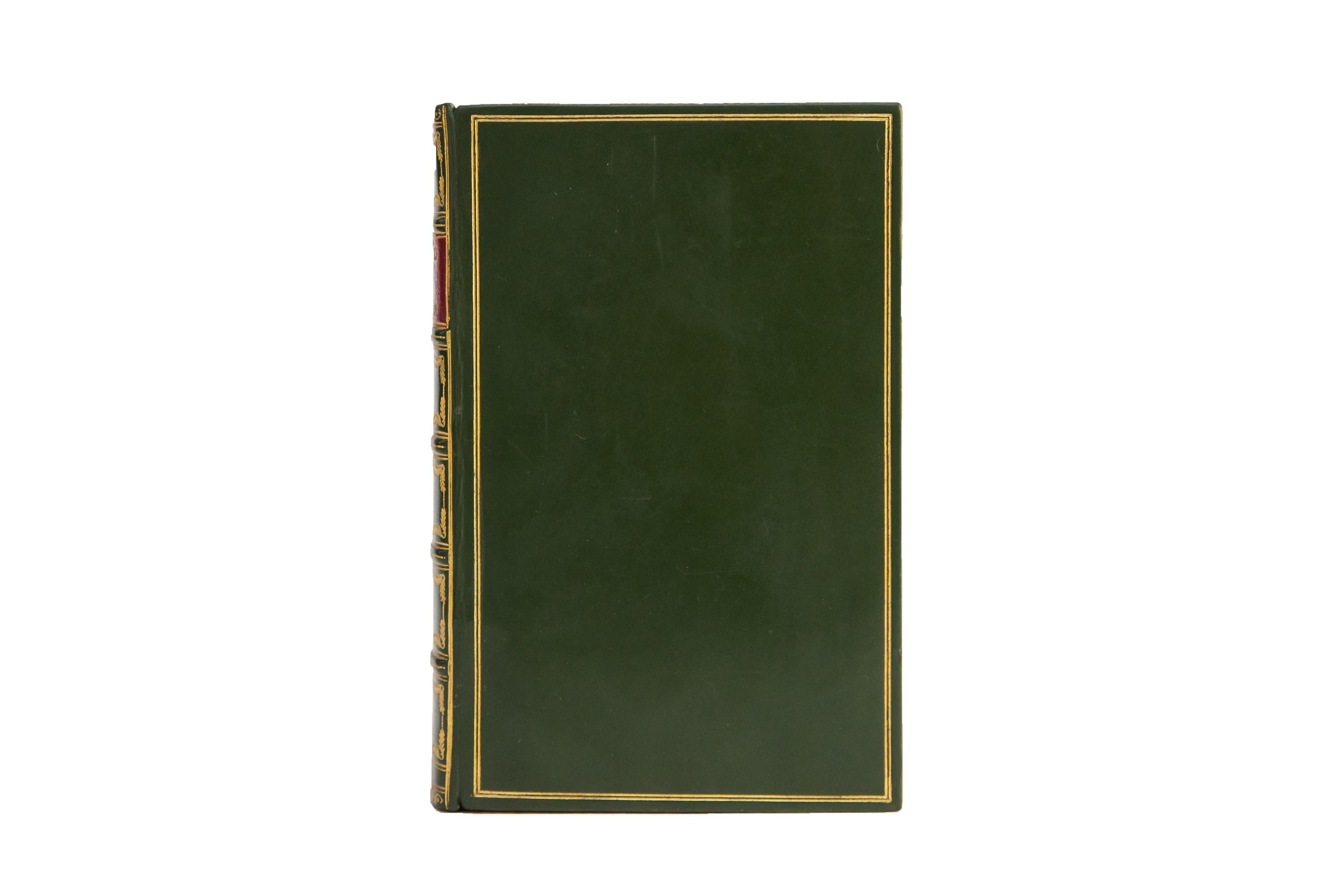1 Volume. Walt Whitman, the Works. Bound in full green calf with a gilt tooled double border. Raised bands gilt with panels displaying pine details and label lettering in gilt tooling as well as a red morocco label. All of the edges are gilt with