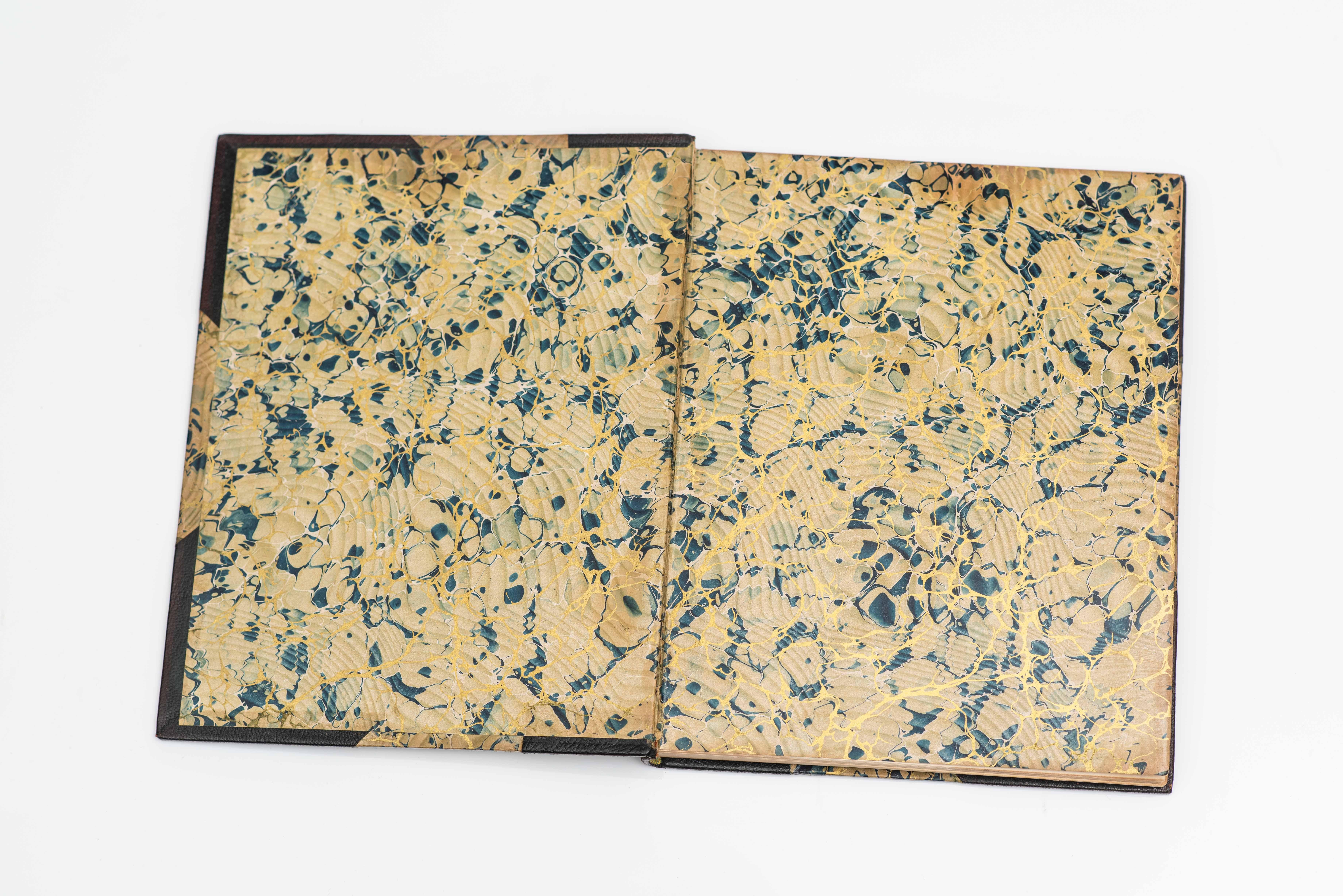 1 Volume. Washington Irving, Rip Van Winkle. Bound in 3/4 green morocco with marbled boards. Gilt-tooled details on the raised band spine. Top edges gilt. Marbled endpapers. Photograph frontispiece and profusely illustrated throughout by Frank T.