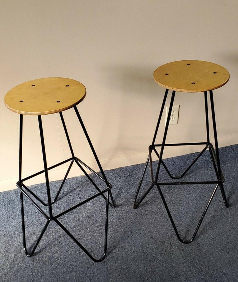 1 Weinberg style hairpin stool multiple available.

Great industrial style bar stools in wrought iron with a hairpin base and wood seats. We have 16 available.


