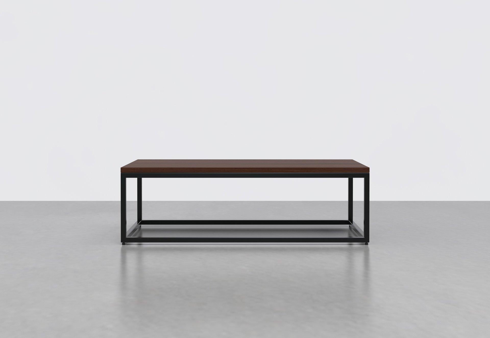 The 1 x 1 coffee table's simple frame allows you to fit it into any space and pairs well with any interior style. Great in any living room or lobby area. Measures: 42