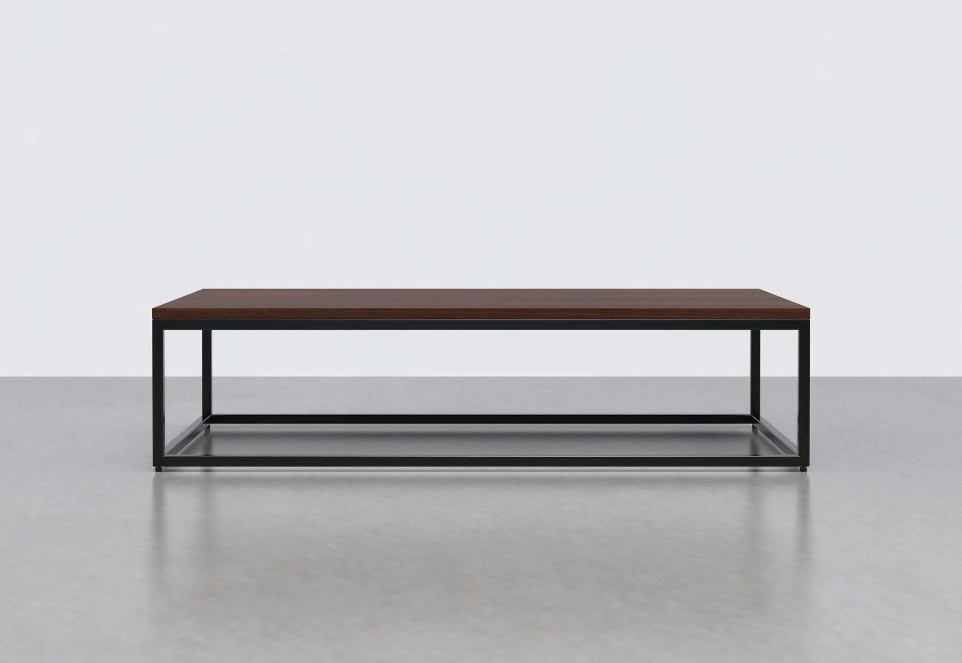 The 1 x 1 coffee table's simple frame allows you to fit it into any space and pairs well with any interior style. Great in any living room or lobby area. Measures: 60