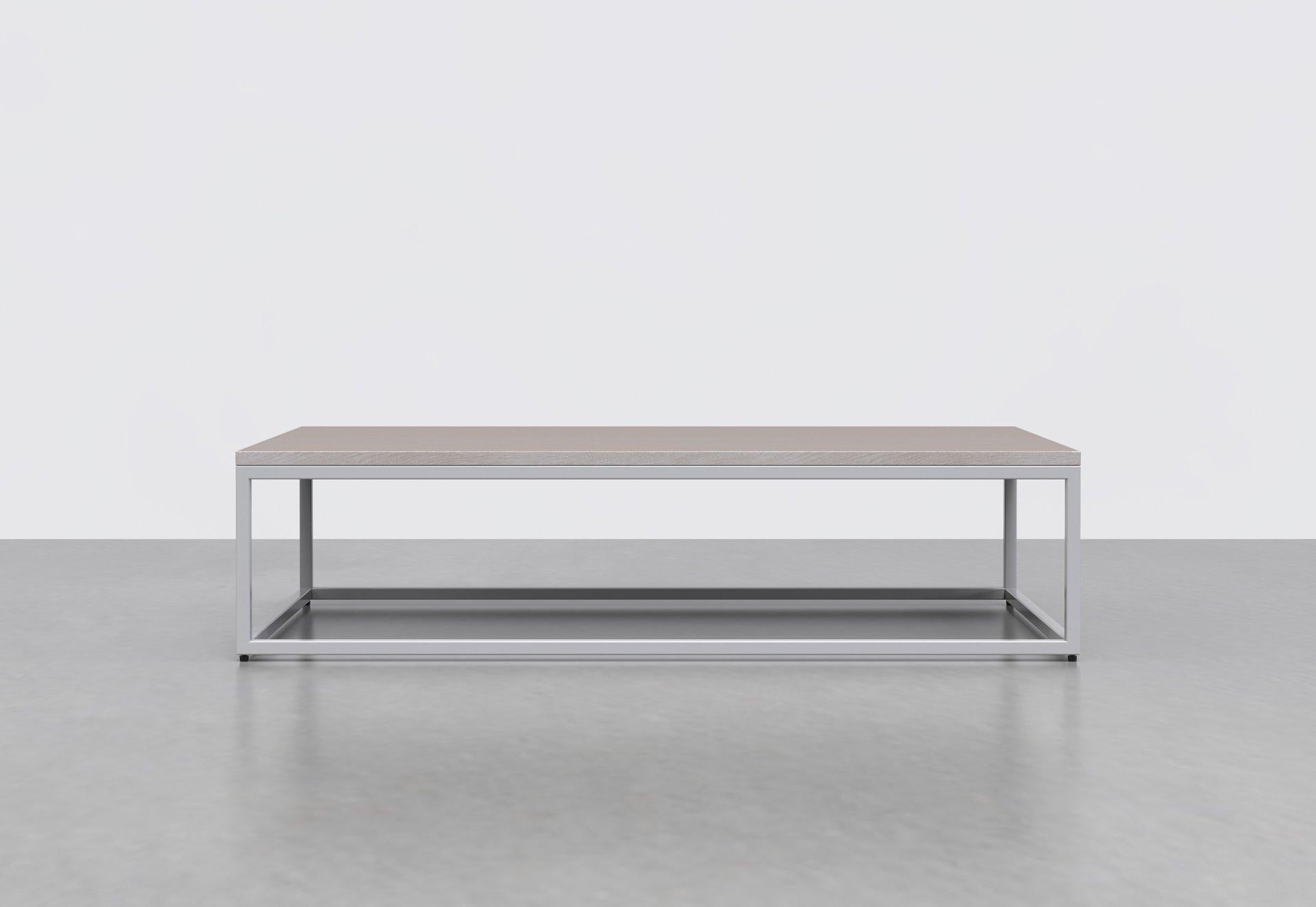 The 1 x 1 coffee table's simple frame allows you to fit it into any space and pairs well with any interior style. Great in any living room or lobby area. Measures: 60