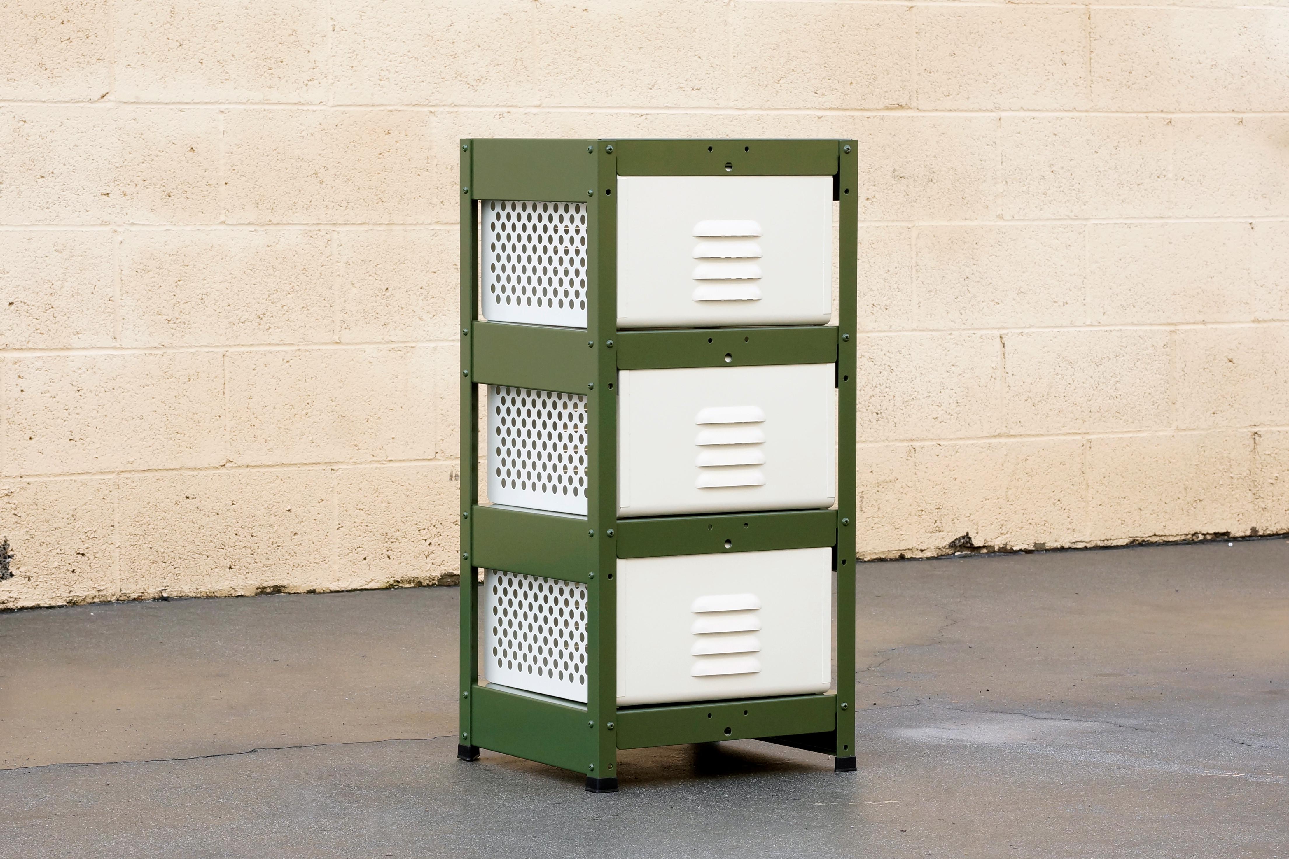 Our newly fabricated locker basket units are inspired by the mid-century classics we've been refinishing for years. Featured here is a 1 x 3 unit with pearl baskets and an army green frame. It's the perfect storage solution for anything from tools,