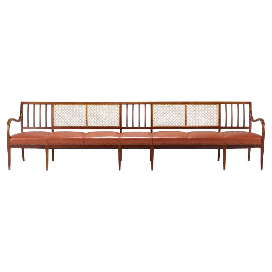 Frits Henningsen Cane, Mahogany, and Leather 10 1/2 Ft Bench For Sale
