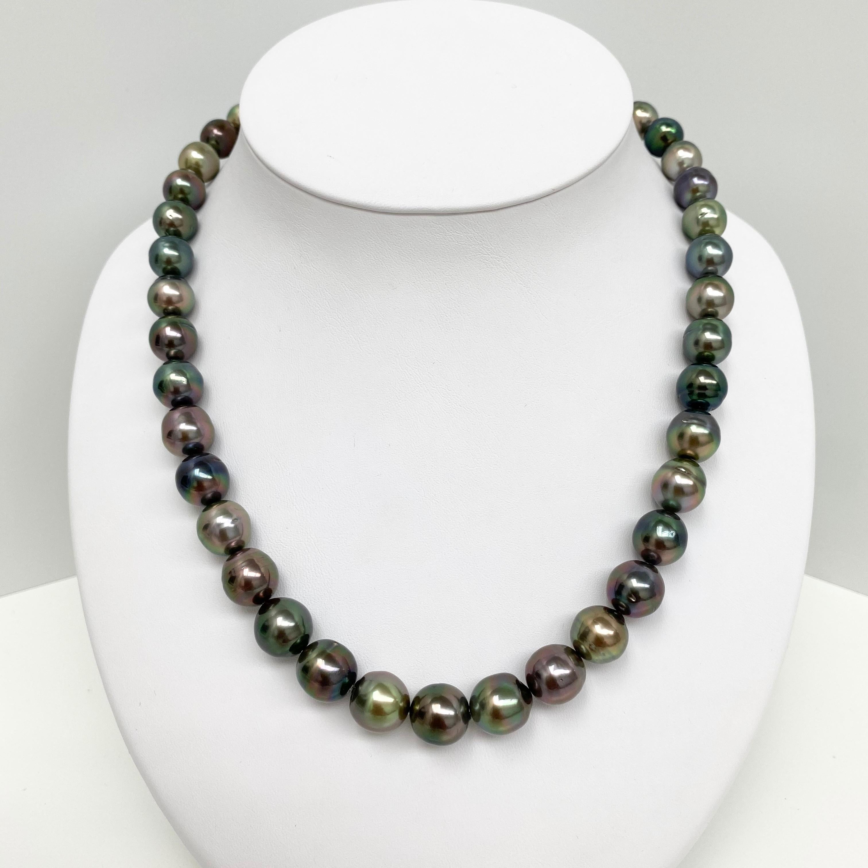 10-11mm Tahitian Multicolor Oval Pearl Necklace with Gold Clasp
AAA Quality, Tahitian Multicolor Peacock Oval Pearl Necklace, 18 inches hand-knotted with gold fish-hook clasp #CP100
