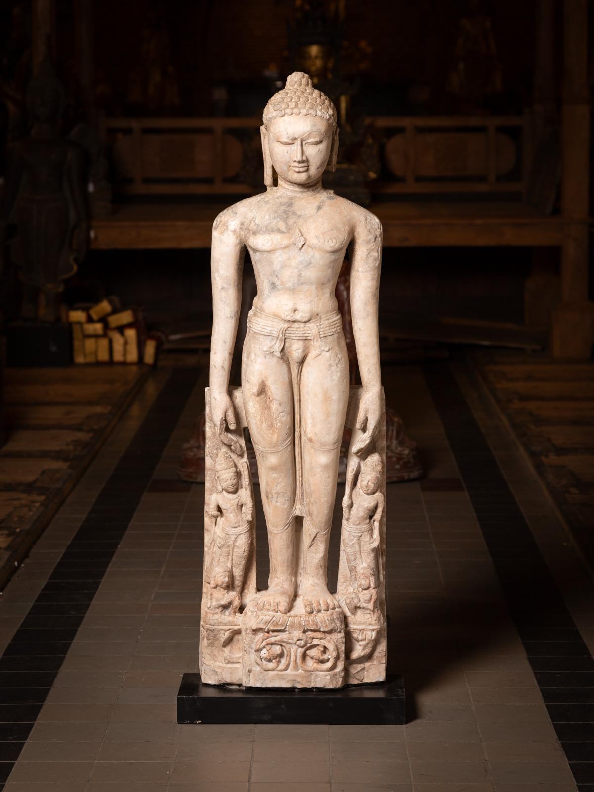 This special antique marble figure of a Jain Tīrthaṅkara, dating back to the 10th-12th century, is a rare and highly valuable piece of Jain art. Expertly crafted from marble, this exquisite sculpture stands 136 cm high, 48 cm wide, and 22 cm deep,