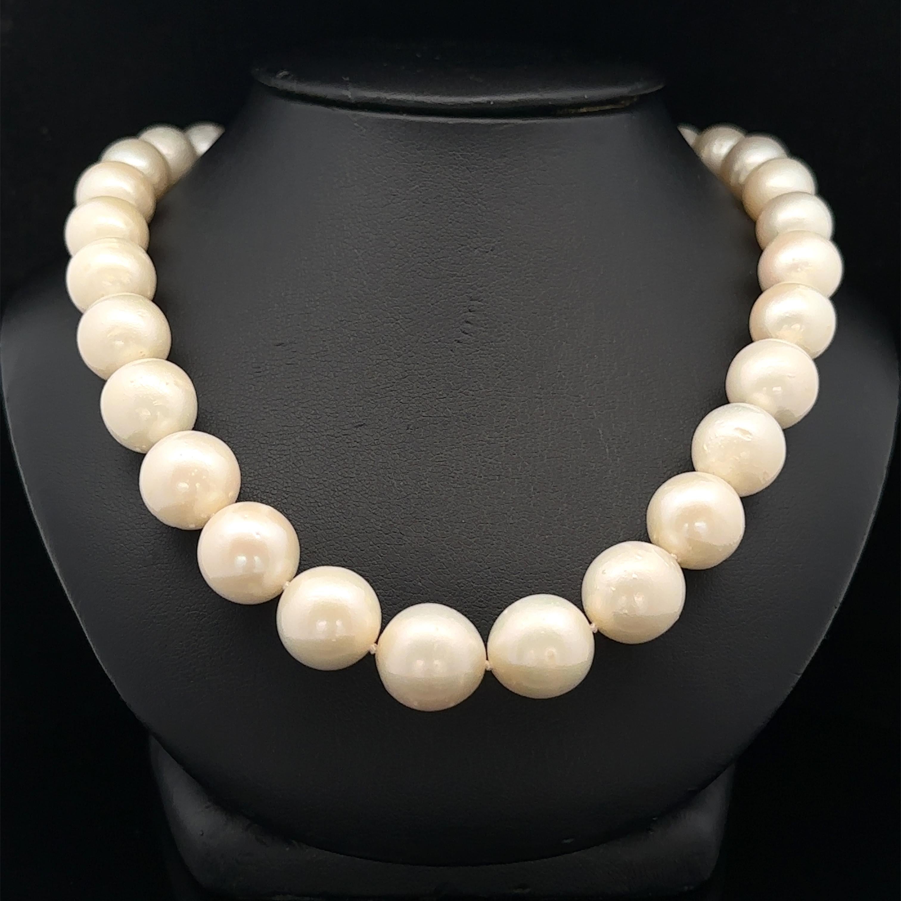 --Stone(s):--
(42) Genuine Cultured Pearls - Round Shape - Strung - White Color - Shows Some Surface Imperfection- 10-13mm each (approx.)
Numerous Natural Genuine Diamonds - Round Brilliant Cut - Pave Set - Nice Brilliant White Color

Material:
