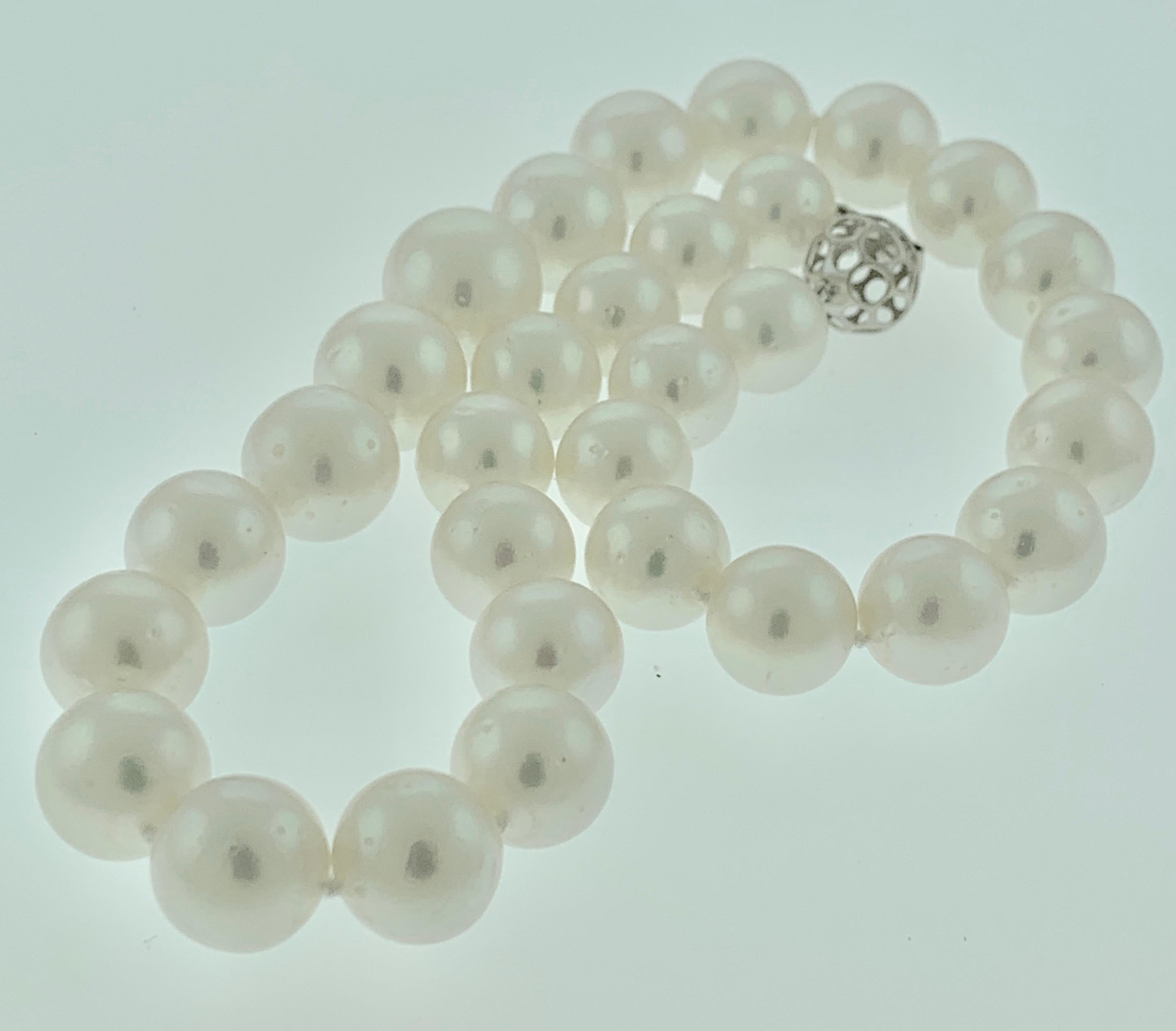 Round Cut White South Sea Pearls Long Strand Necklace 14 Karat Gold Clasp For Sale