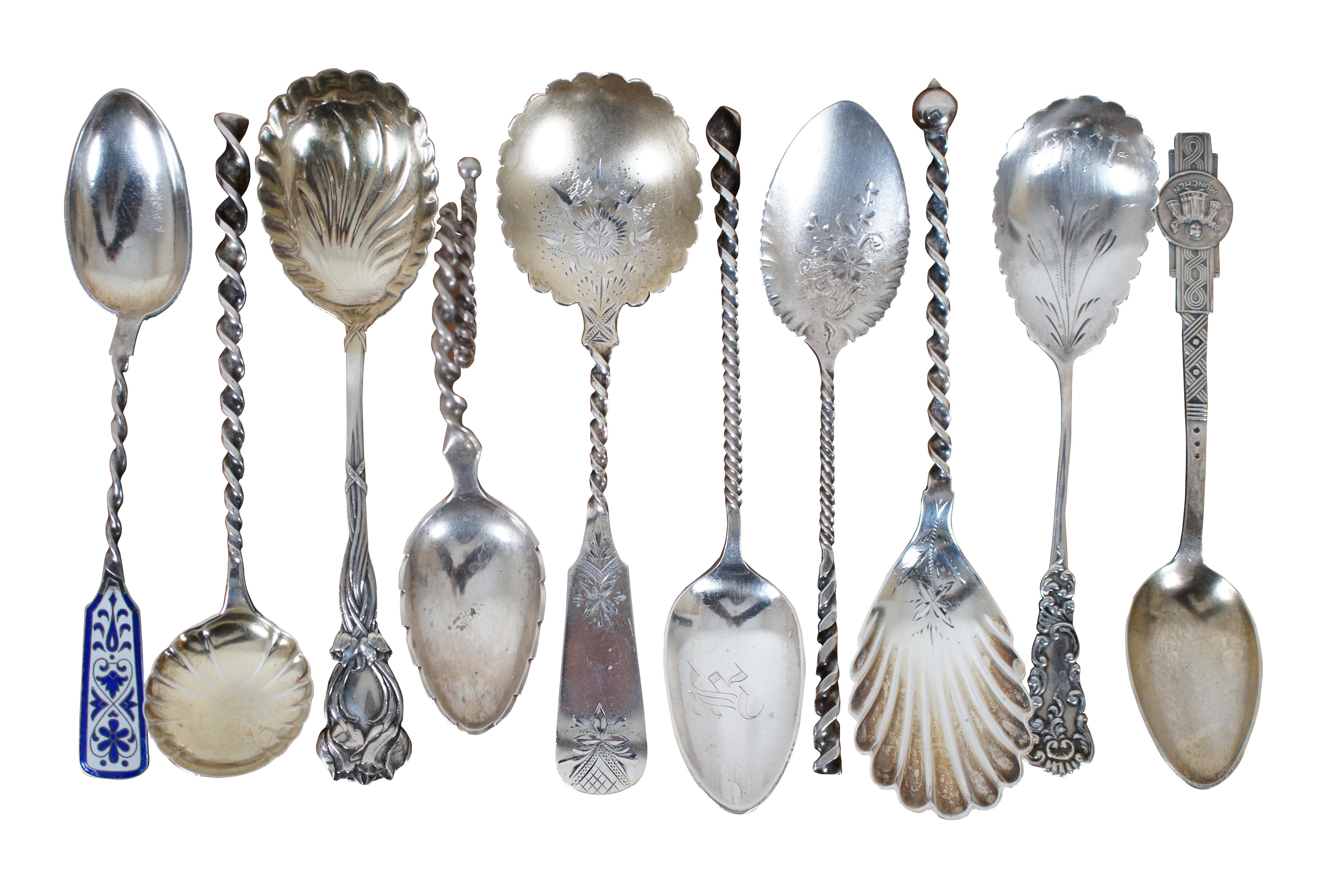 Lot of 10 antique sterling and one 800 silver sugar / tea spoons in a variety of styles and designs including shell bowls, twisted handles, floral motifs and one enameled. Makers include Whiting Mfg Co, Towle Sterling, William B Kerr & Co, Davis &