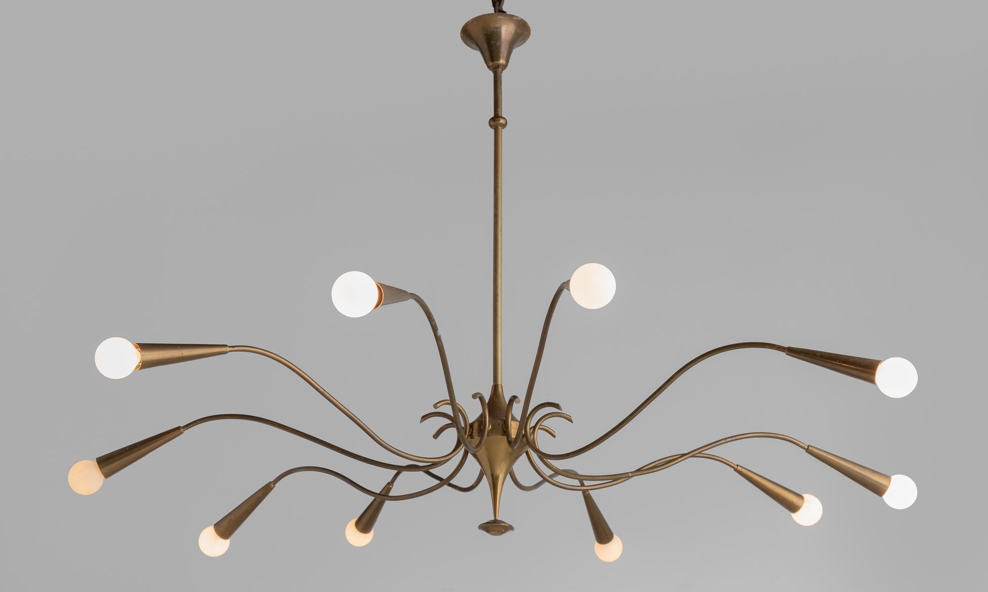 10-Arm Italian brass chandelier, Italy, circa 1960.

All brass chandelier with 10 curved arms. Original condition.

Measures: 48