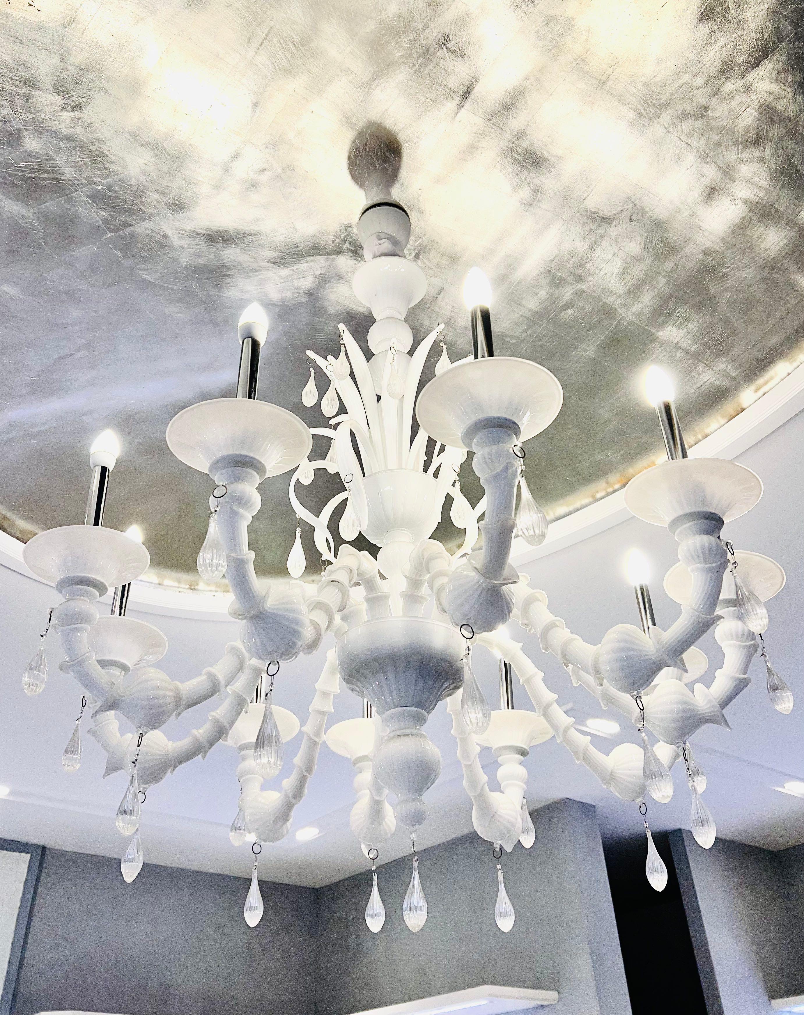 This beautiful 10 Arm Murano Chandelier shows the art and craftsmanship of the artistic glass manufactures and skilled masters in Murano, Italy . Each Part is unique in is manufacture as each piece  mouth-blown in the production process. 

The white
