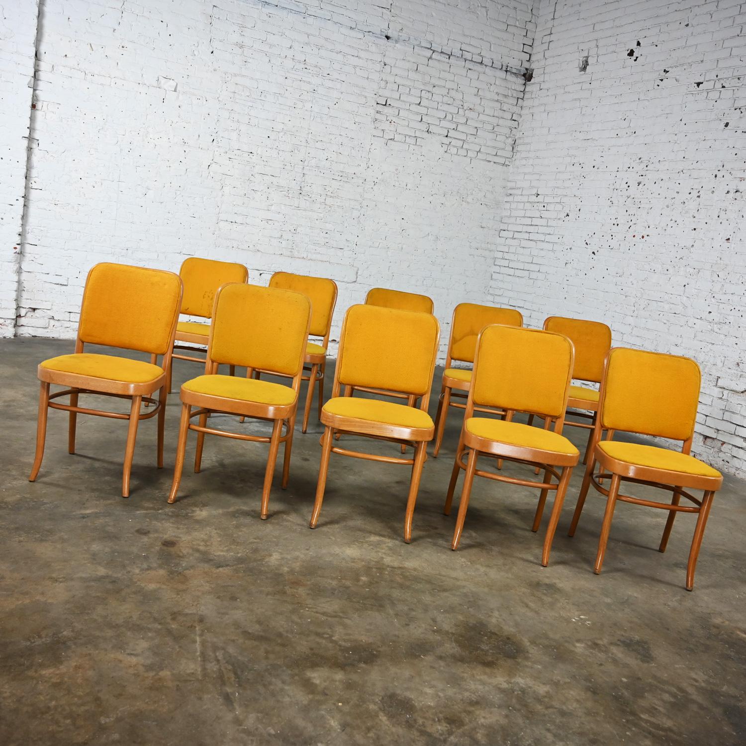 Wonderful vintage Bauhaus beech bentwood frame Thonet Josef Hoffman Prague 811 style armless side dining chairs by Falcon Products Inc., set of 10. Beautiful condition, keeping in mind that these are vintage and not new so will have signs of use and