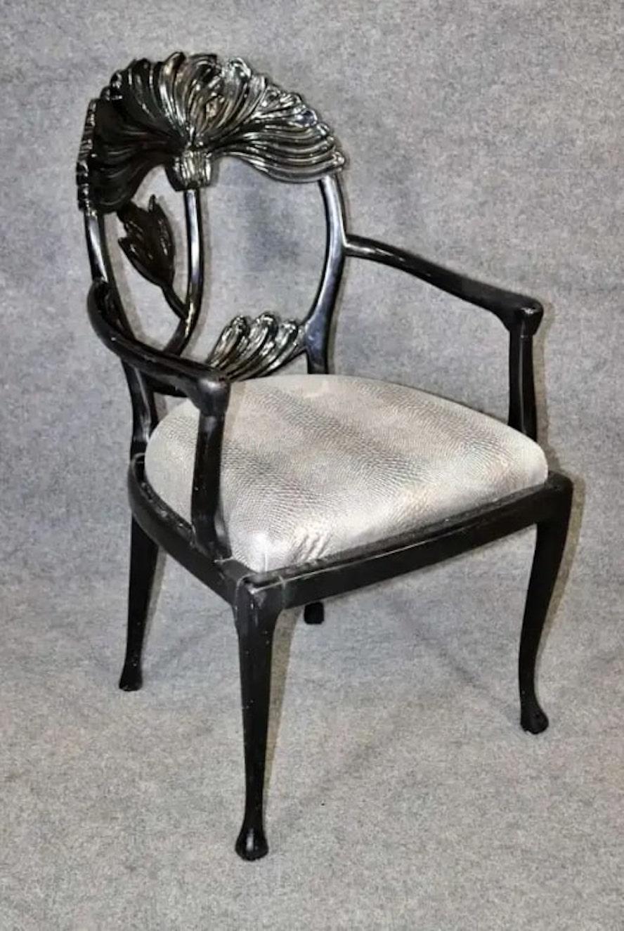 Set of ornate dining chairs with beautifully carved backs. Frames are lacquered in polished black paint. 8 side chairs, 2 arm chairs.
Please confirm location NY or NJ