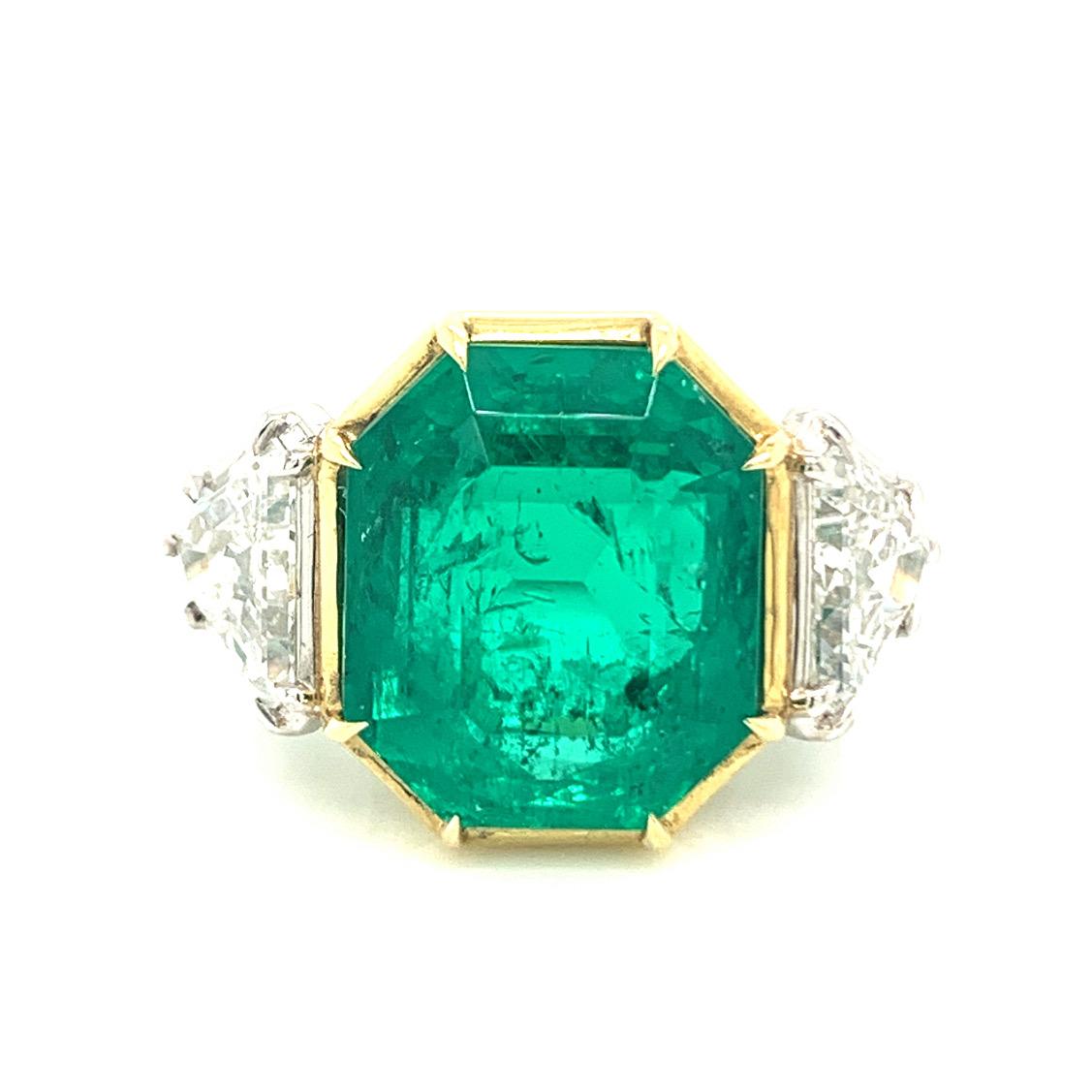 Are you someone who is confident, fashionable and graceful? This will satisfy your desire for a spectacular emerald & diamond ring. All the requirements are fulfilled with this stunning AGL certified 10.03 carat Colombian emerald and by two very