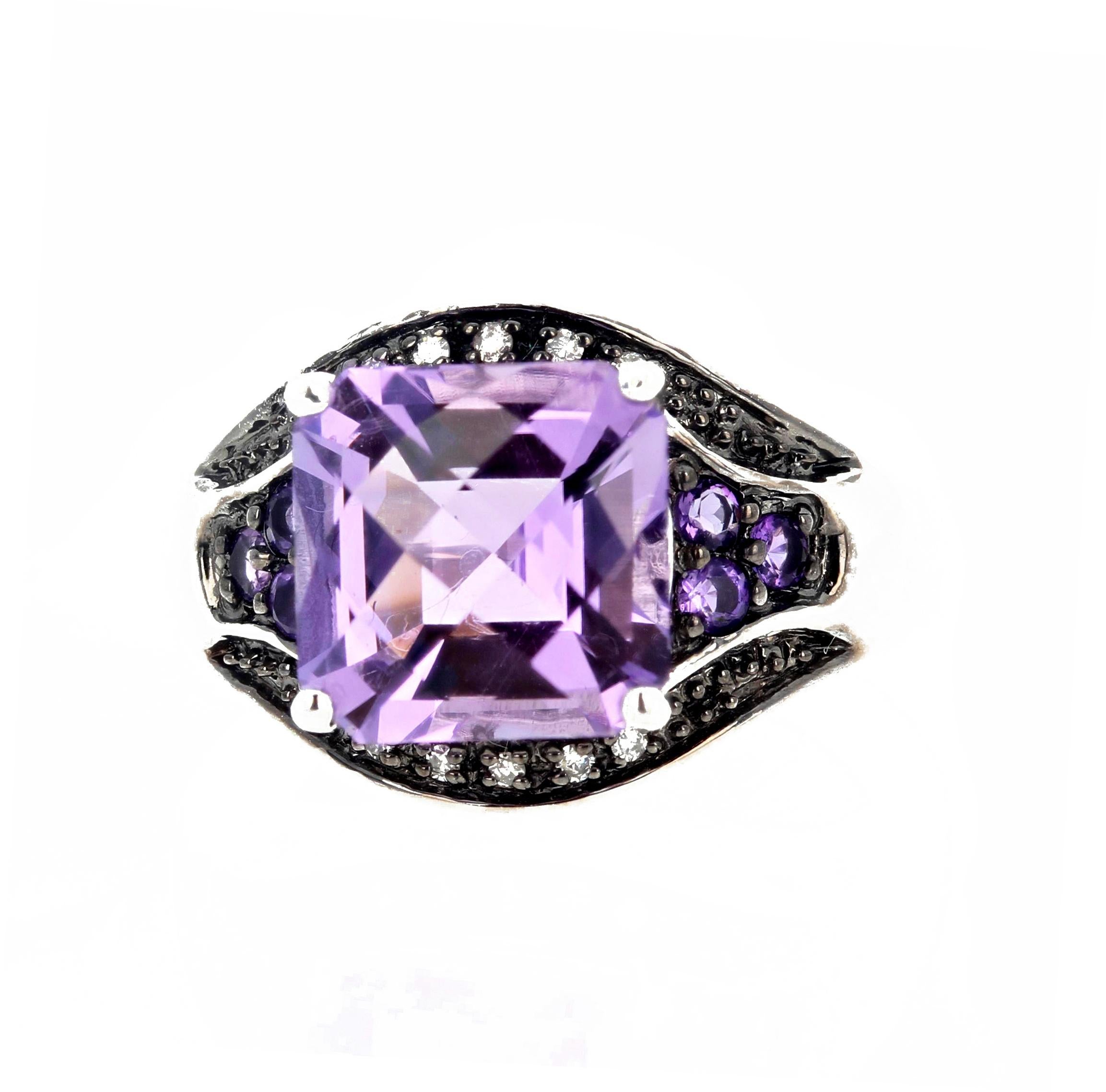 diamond ring with amethyst side stones