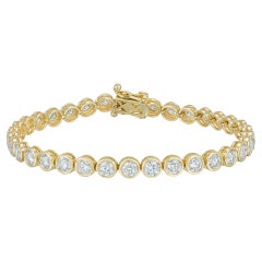 Bracelet de tennis en or jaune 18 carats serti d'un chaton de diamants naturels de 10 carats