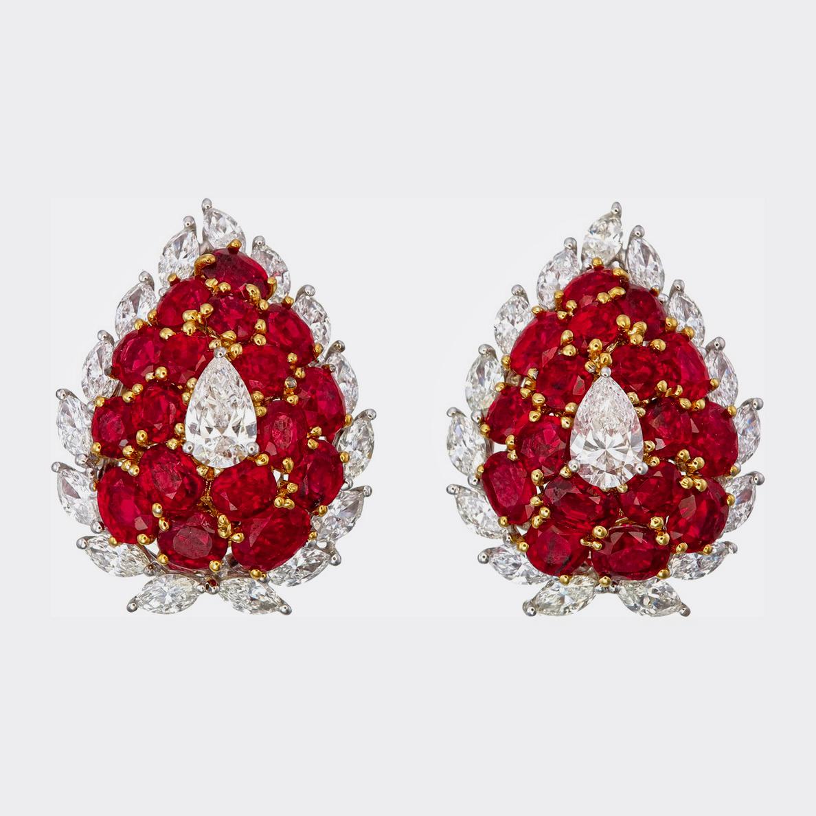 A classic elegance for your jewels collection with these stunning ruby and diamond earrings made by Rewa jewels crafted in 18 karat white gold.

There are 34 Burmese rubies without any heat treatment, weighing approximately 10.00 carat